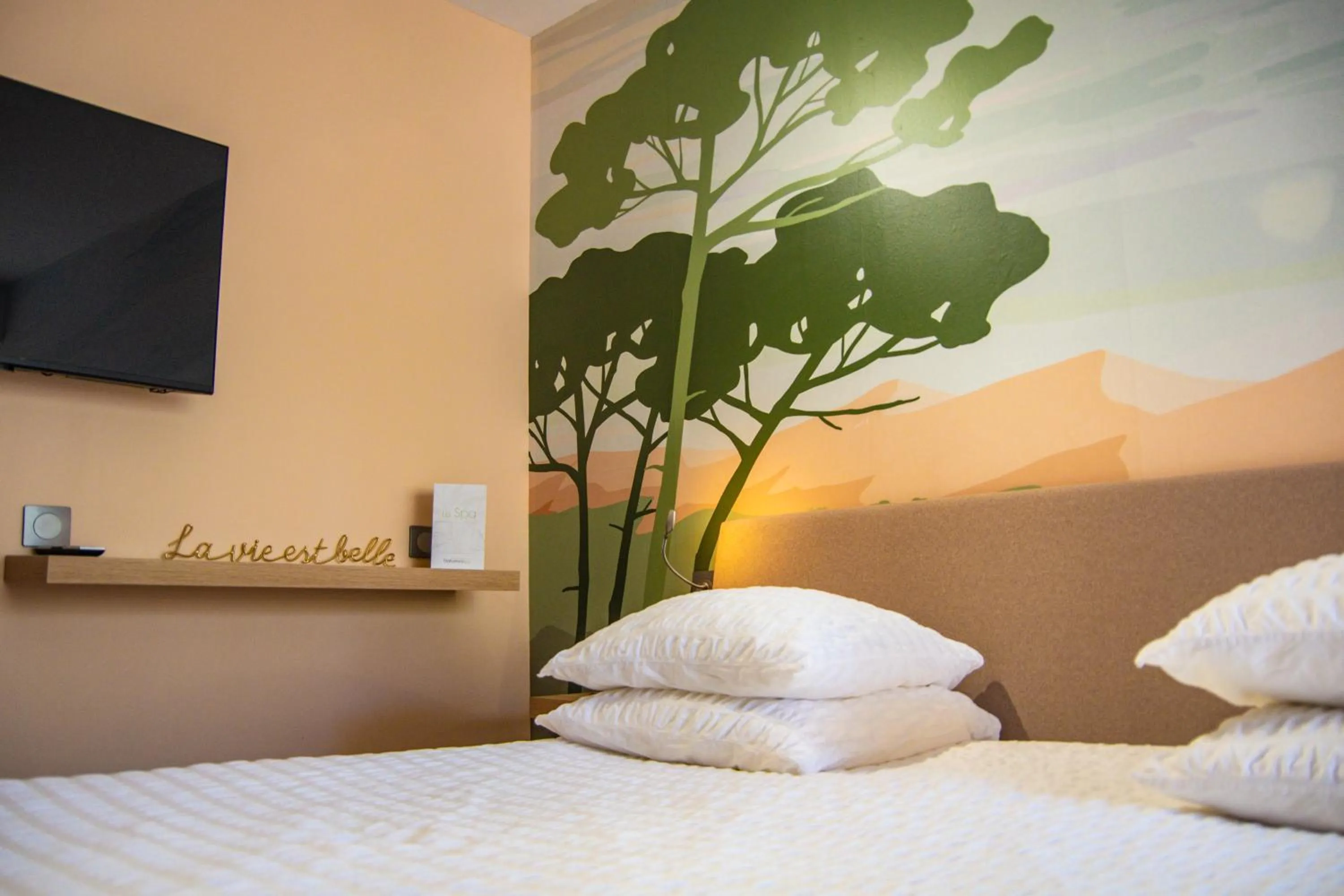 Bed in Résidence Hôtelière Natureva & Spa