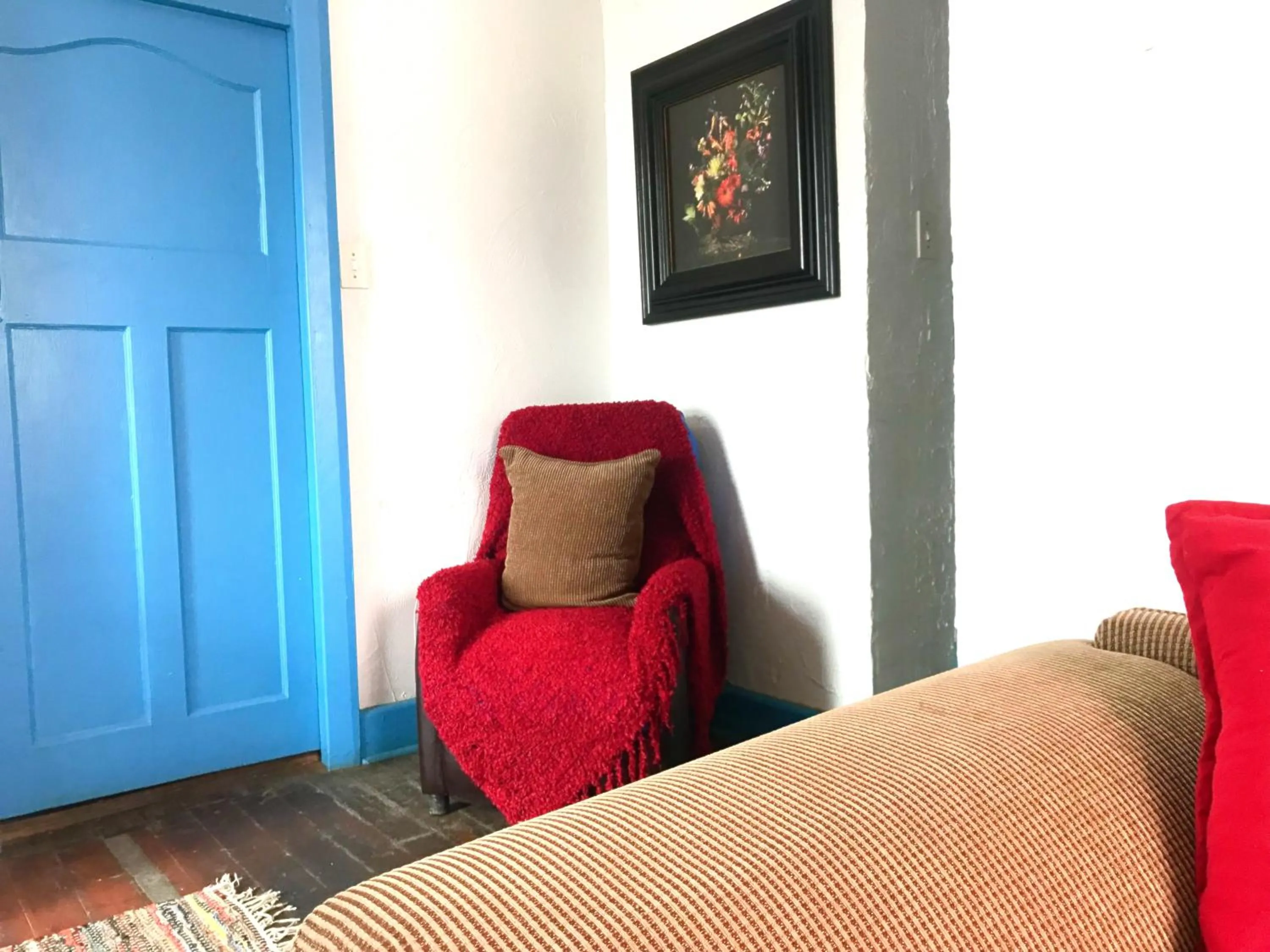 Communal lounge/ TV room in Athenian Villa