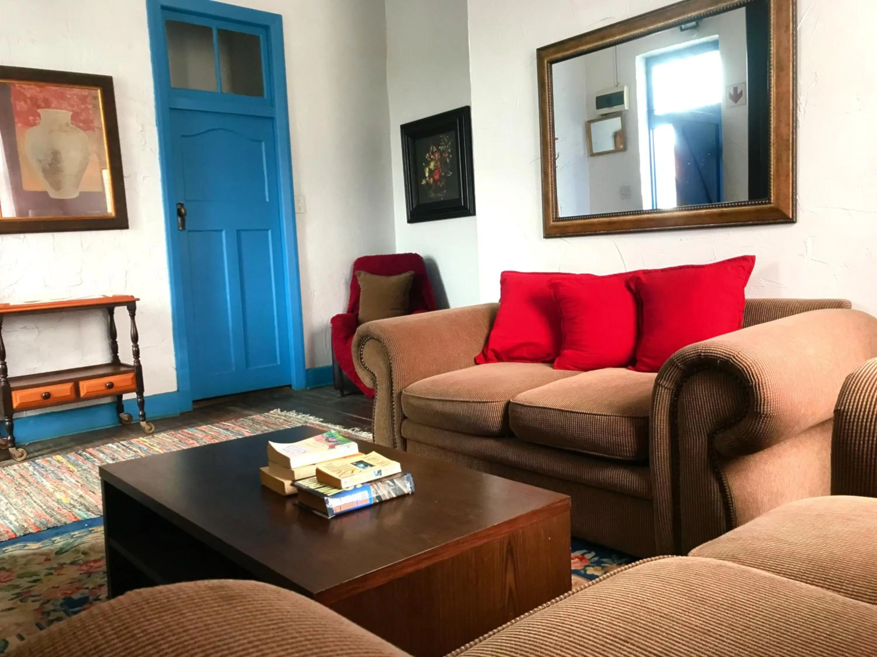 Communal lounge/ TV room in Athenian Villa