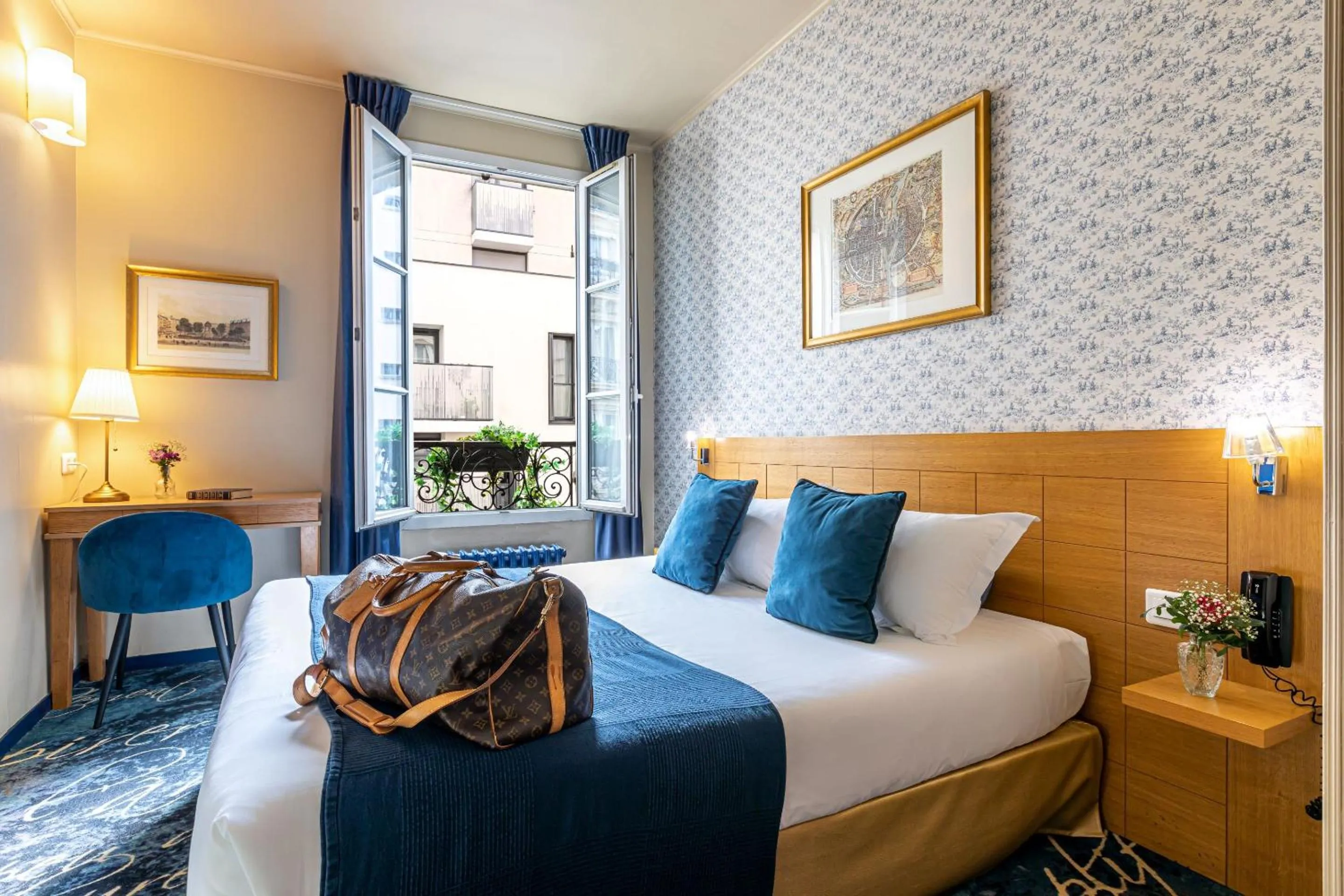 Bed in Hotel Romance Malesherbes by Patrick Hayat