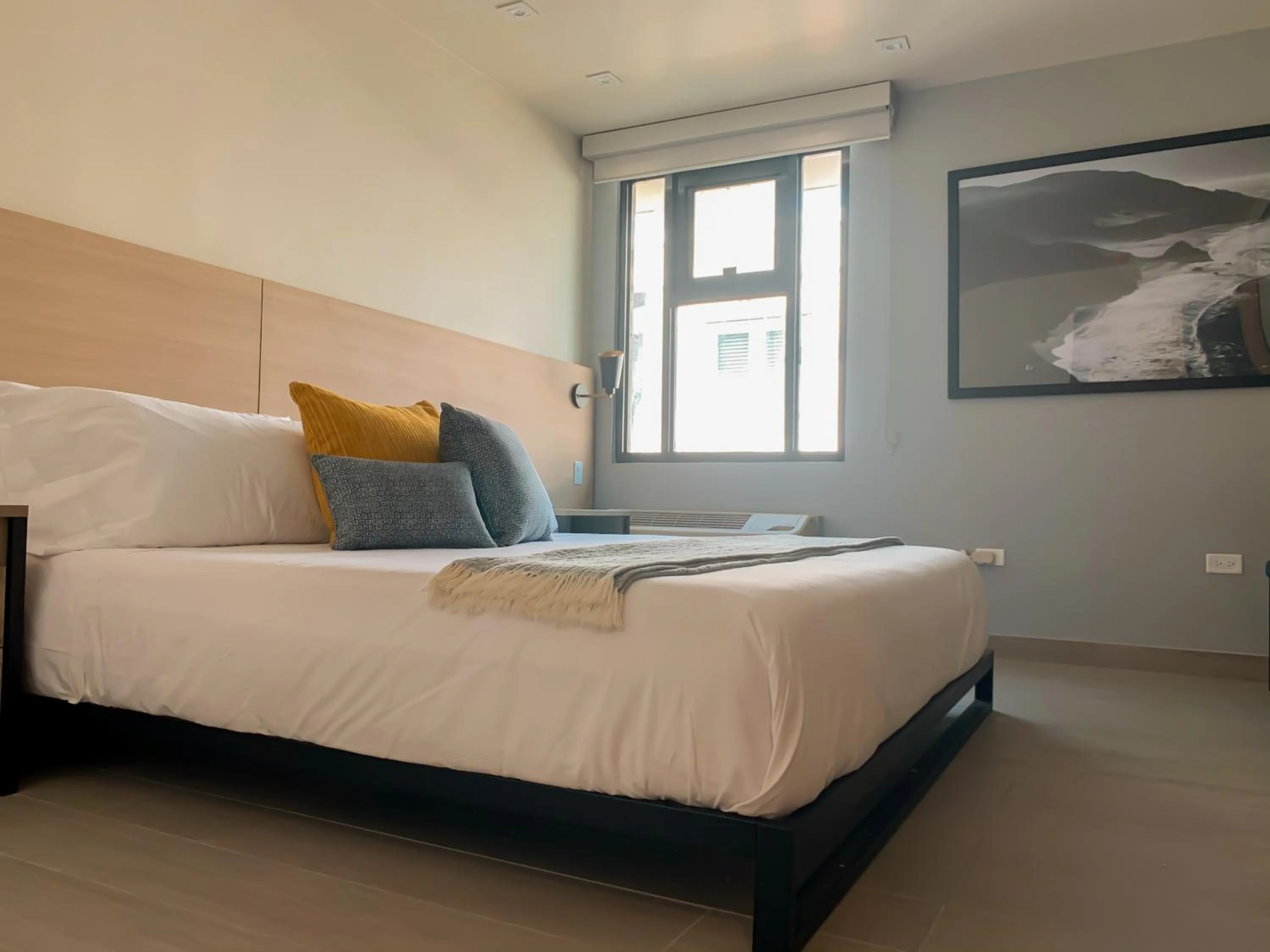 Bed in The Ivy Hotel