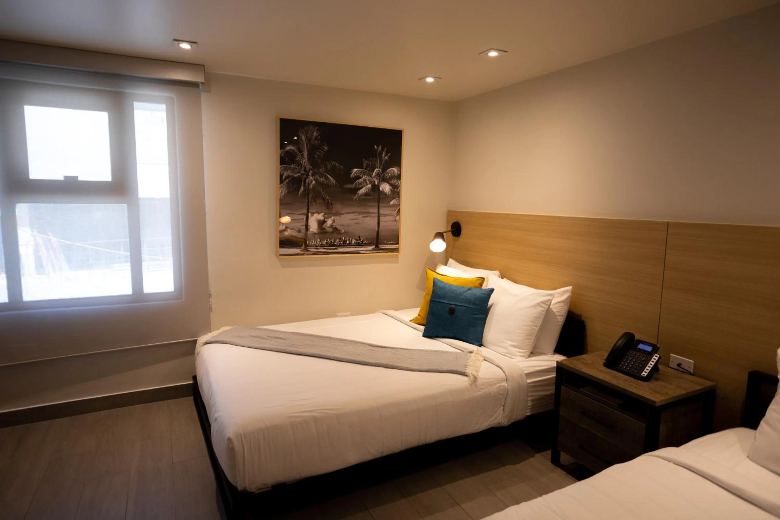 Bedroom in The Ivy Hotel