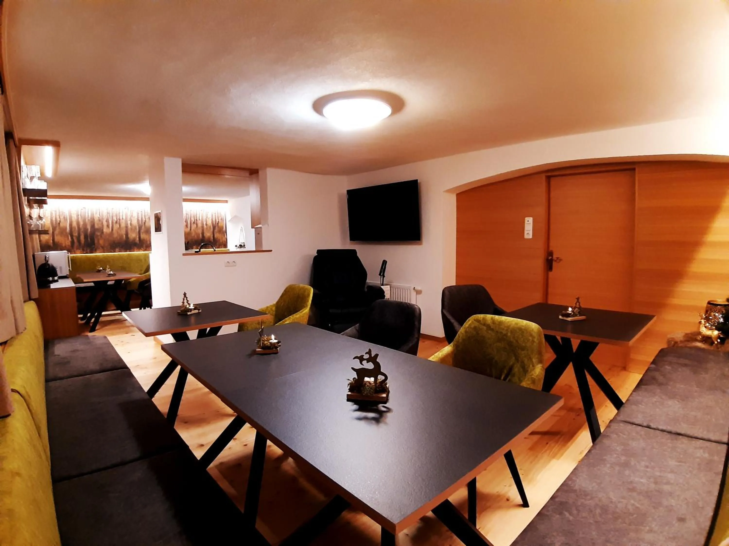 Communal lounge/ TV room in Lärchenhof Serfaus