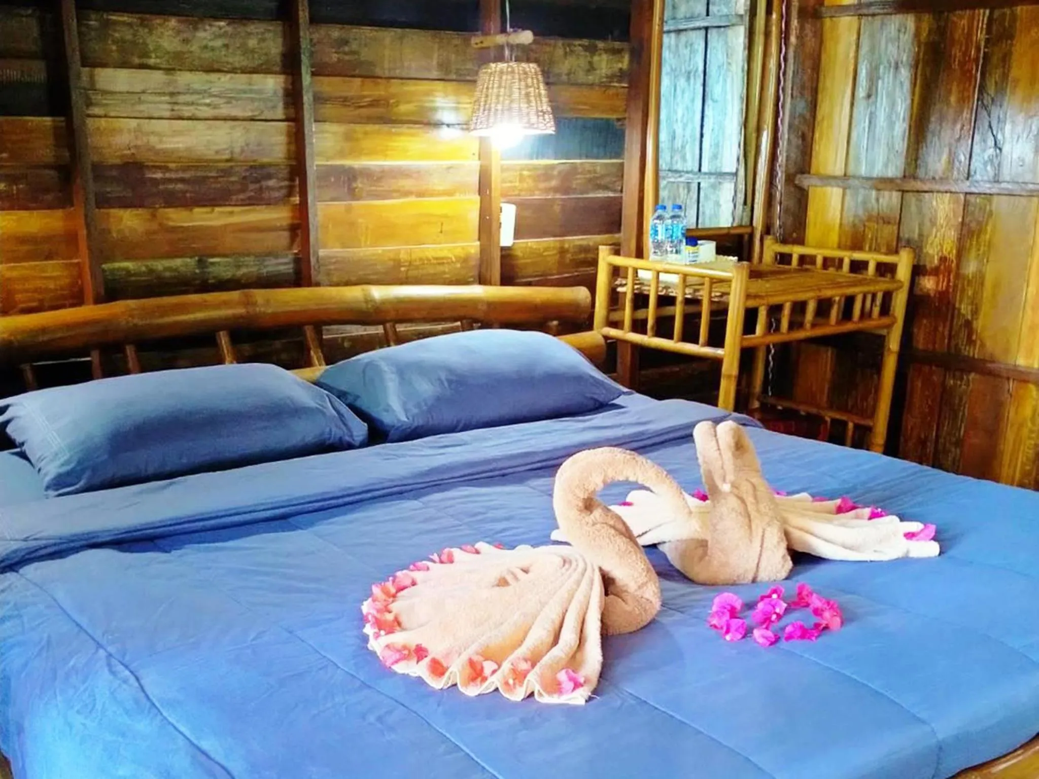 Bed in Bonhomie Beach Cottage