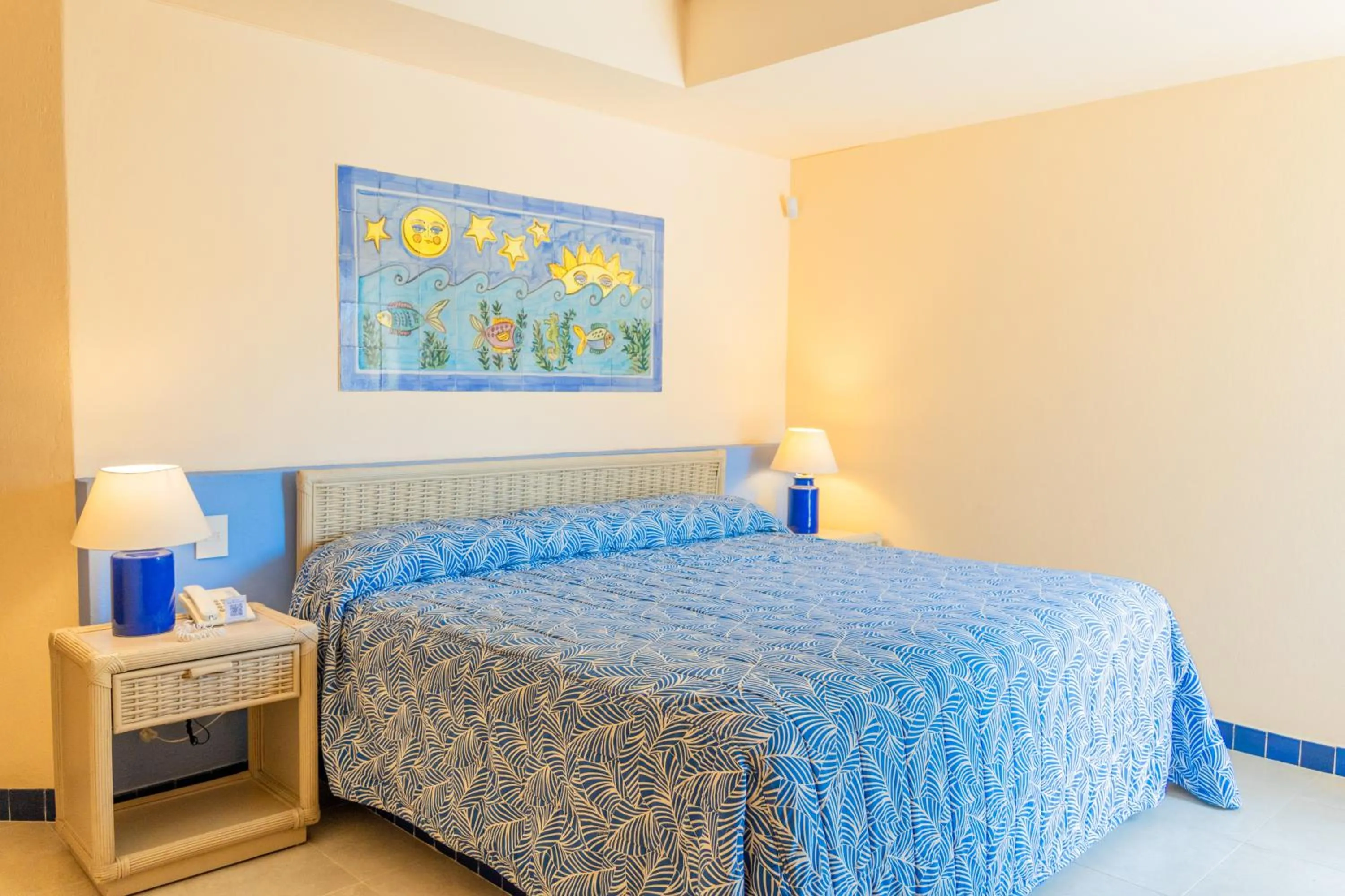 Bed in Zuana Beach Resort