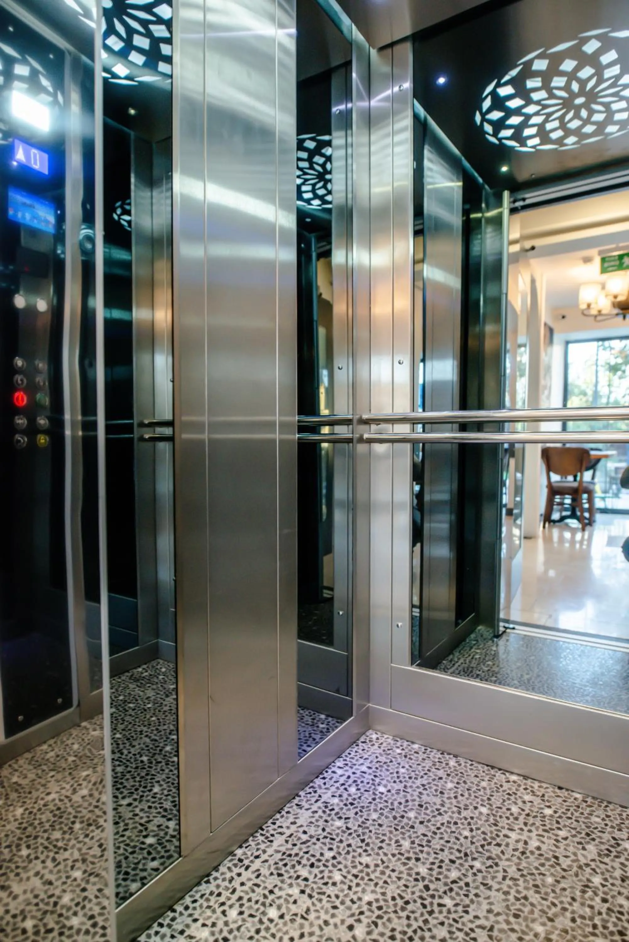 elevator in The Camelot Hotel