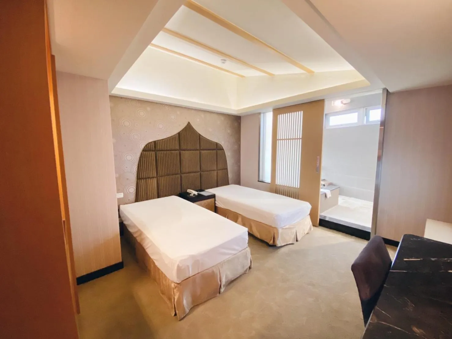 Bed in JinShan Sakura Bay Hot Spring Hotel