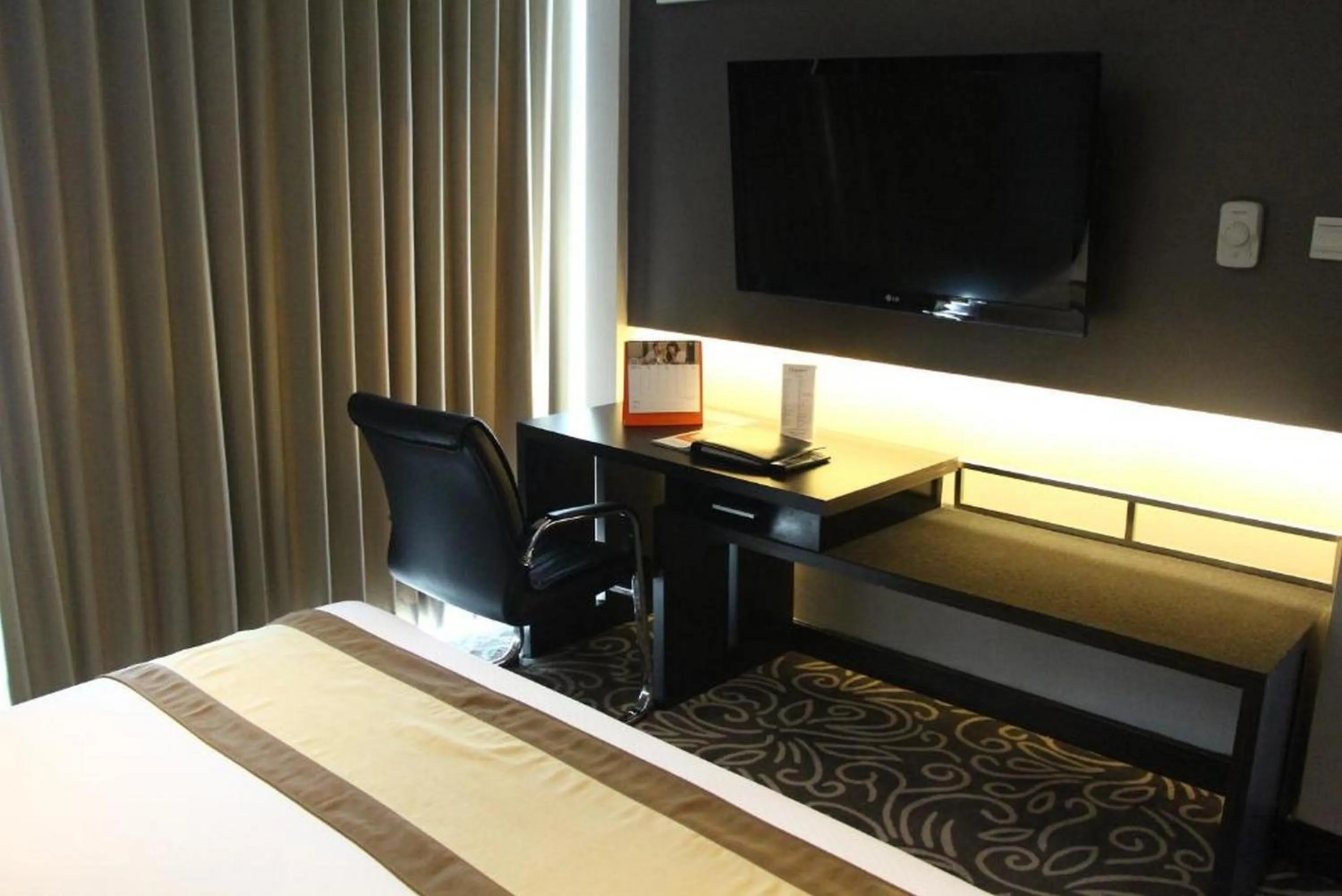 Bedroom in Swiss-Belhotel Balikpapan