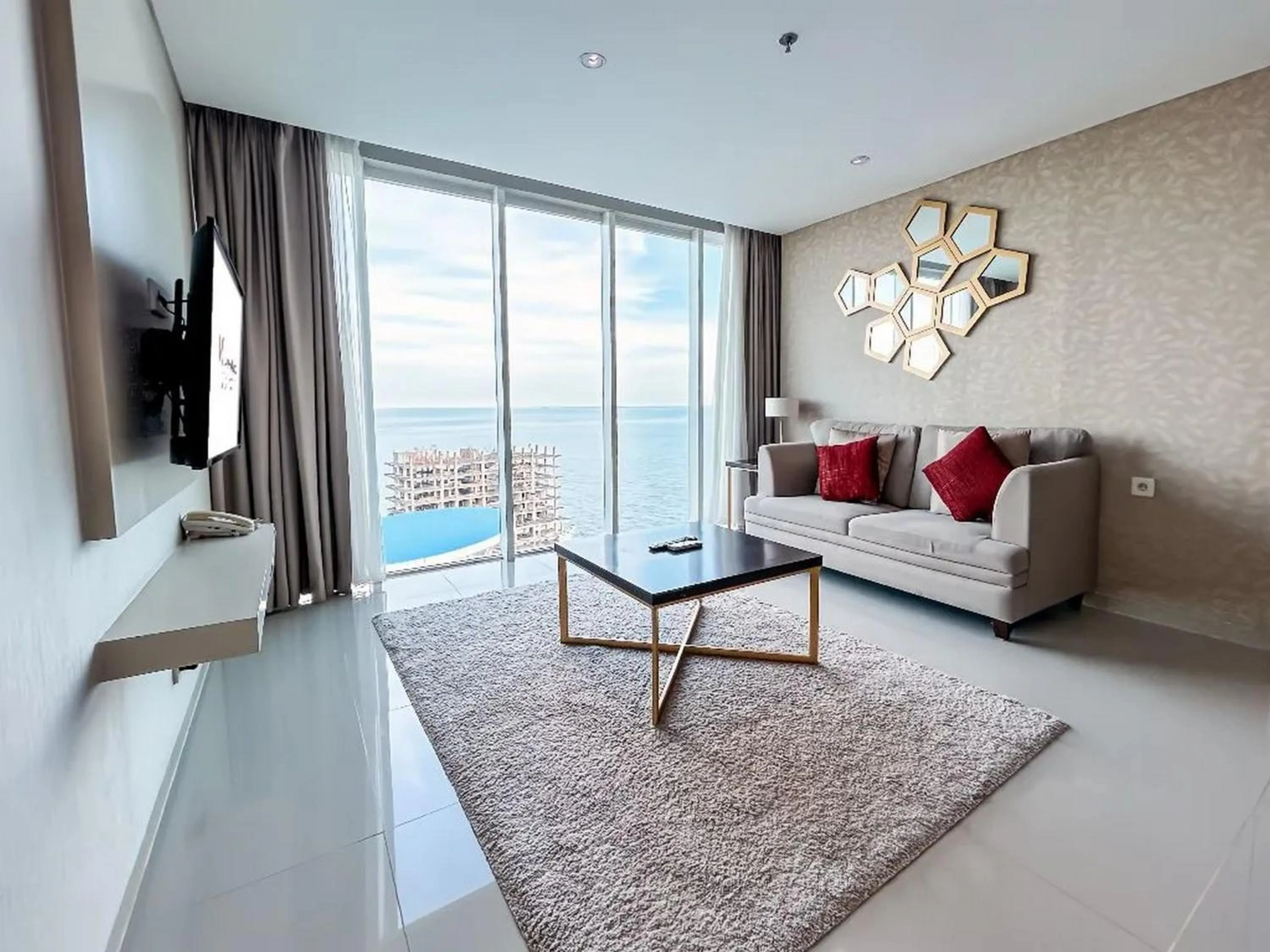 Living room, Bed in Swiss-Belhotel Balikpapan