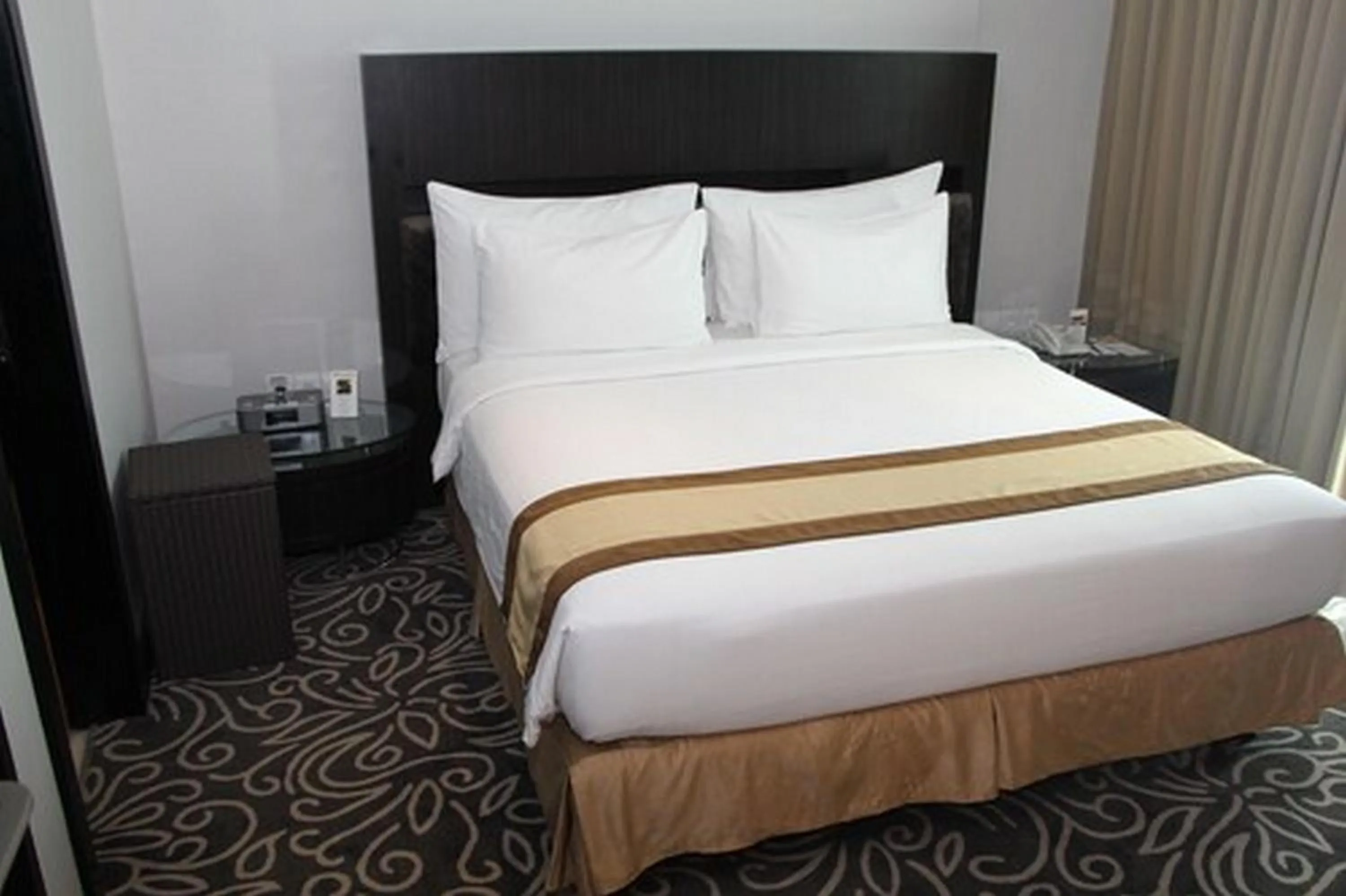 Bed in Swiss-Belhotel Balikpapan