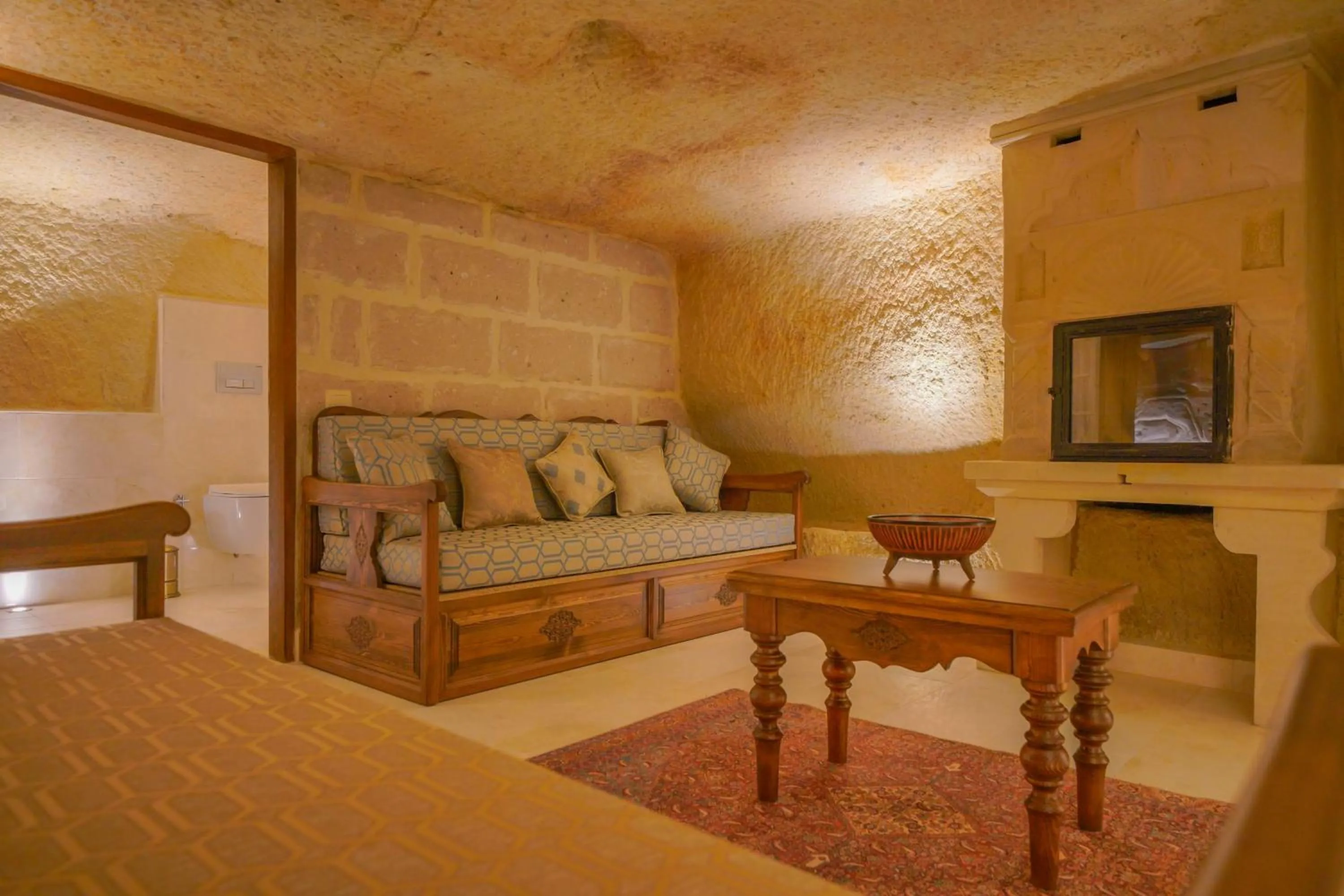 Living room, Bed in Fairyland Cave Hotel