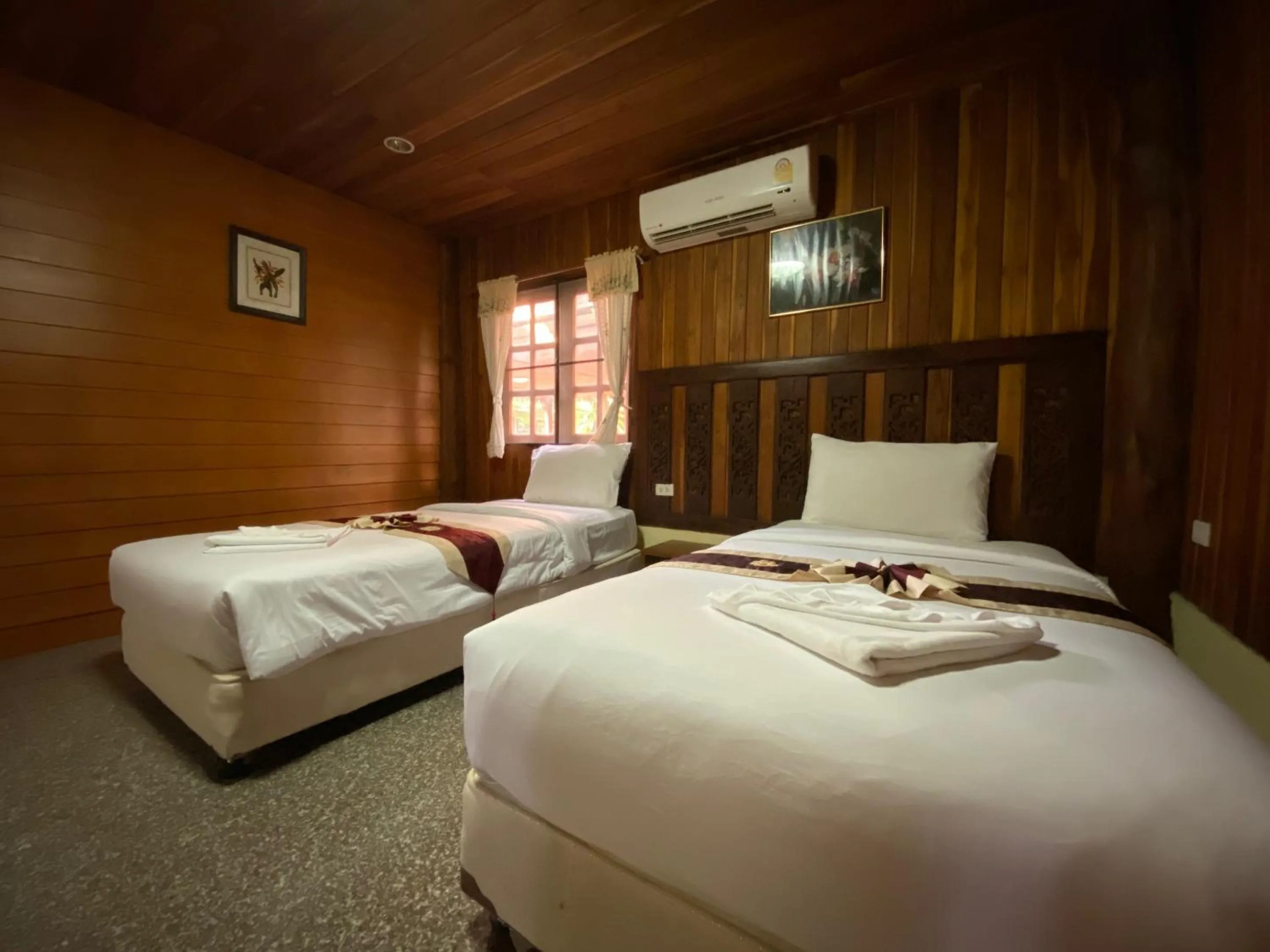 Photo of the whole room, Bed in Yuwadee Resort