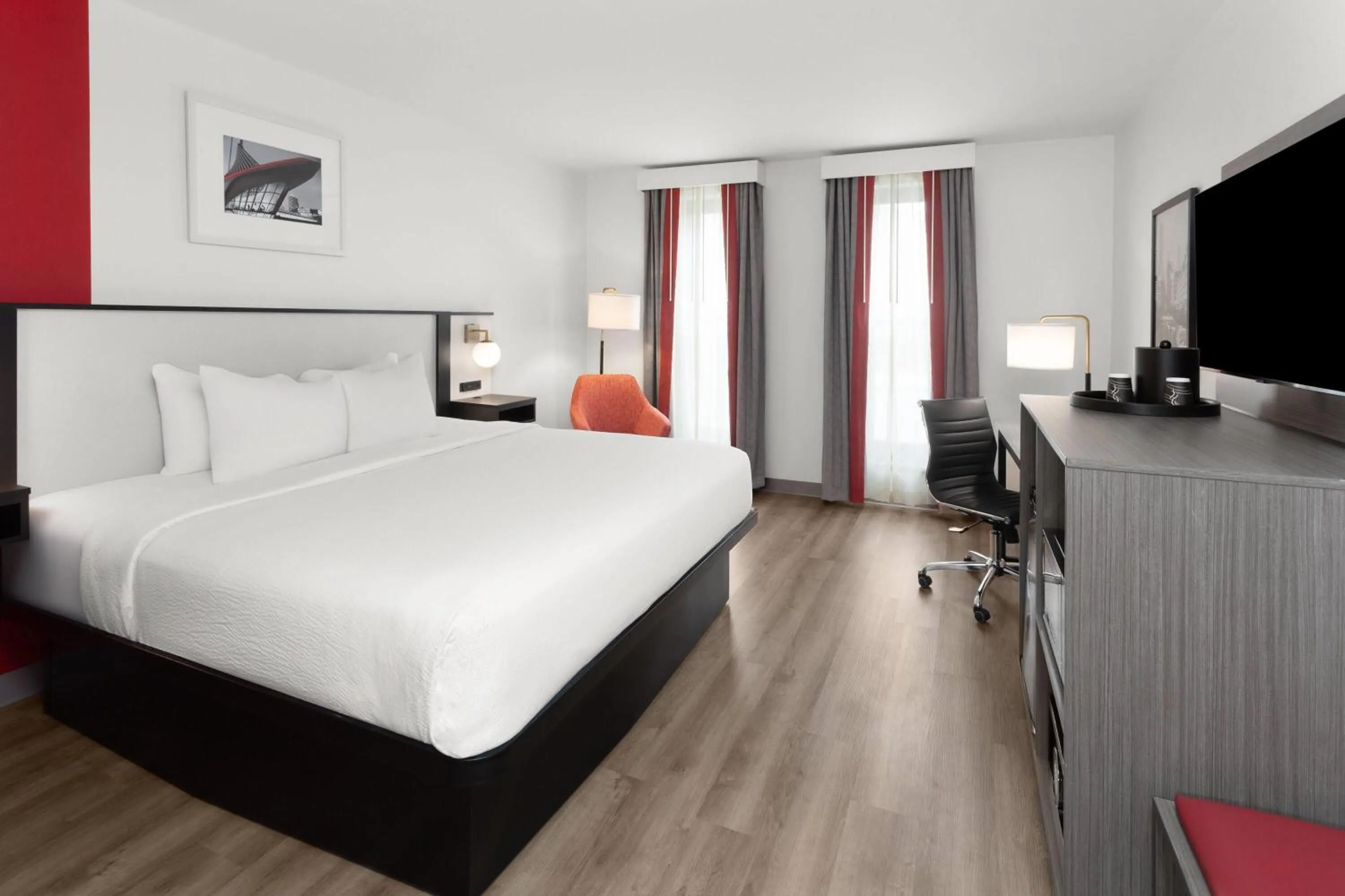 Photo of the whole room, Bed in Ramada by Wyndham Milwaukee