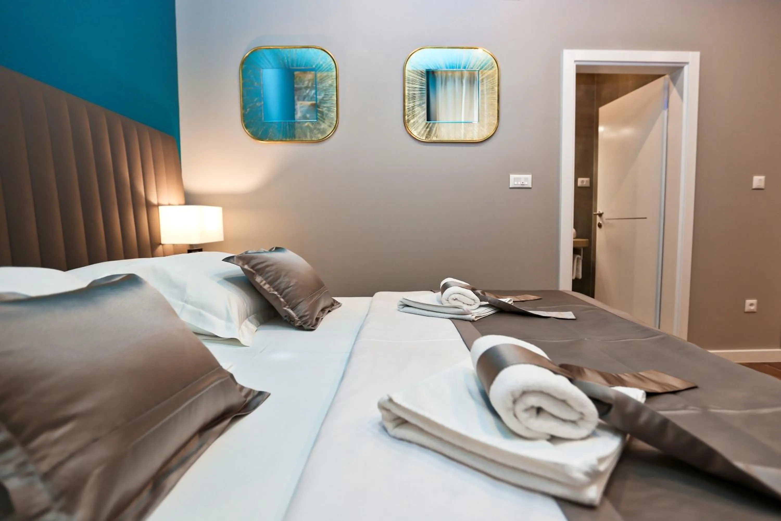 Decorative detail, Bed in Riva Luxury Rooms