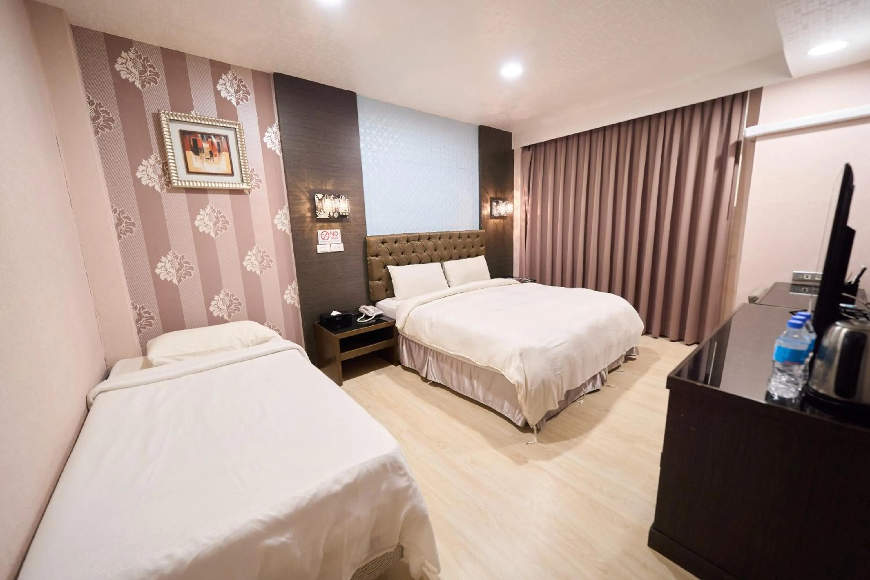 Bed in The Riverside Hotel Fashion