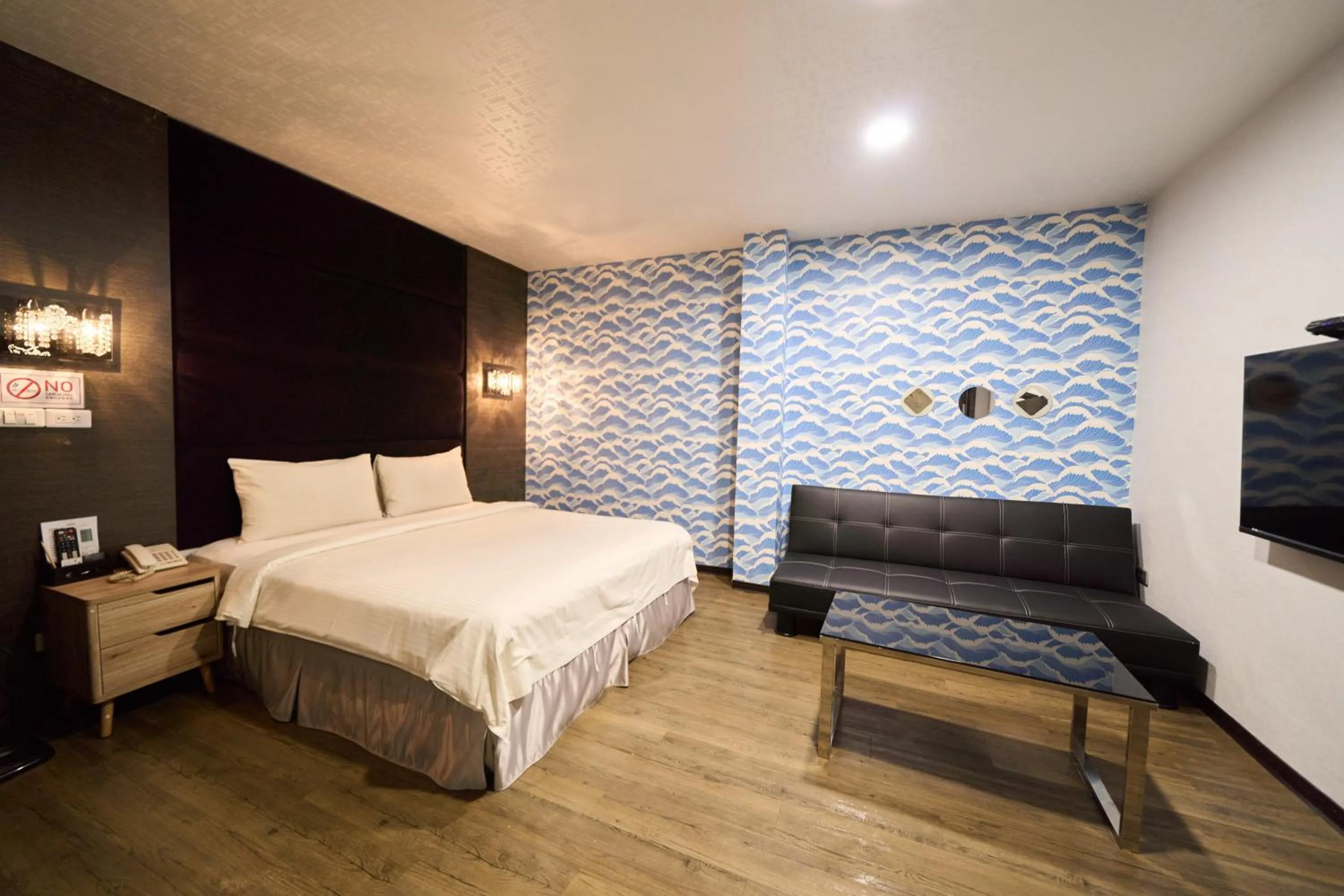 Bed in The Riverside Hotel Fashion