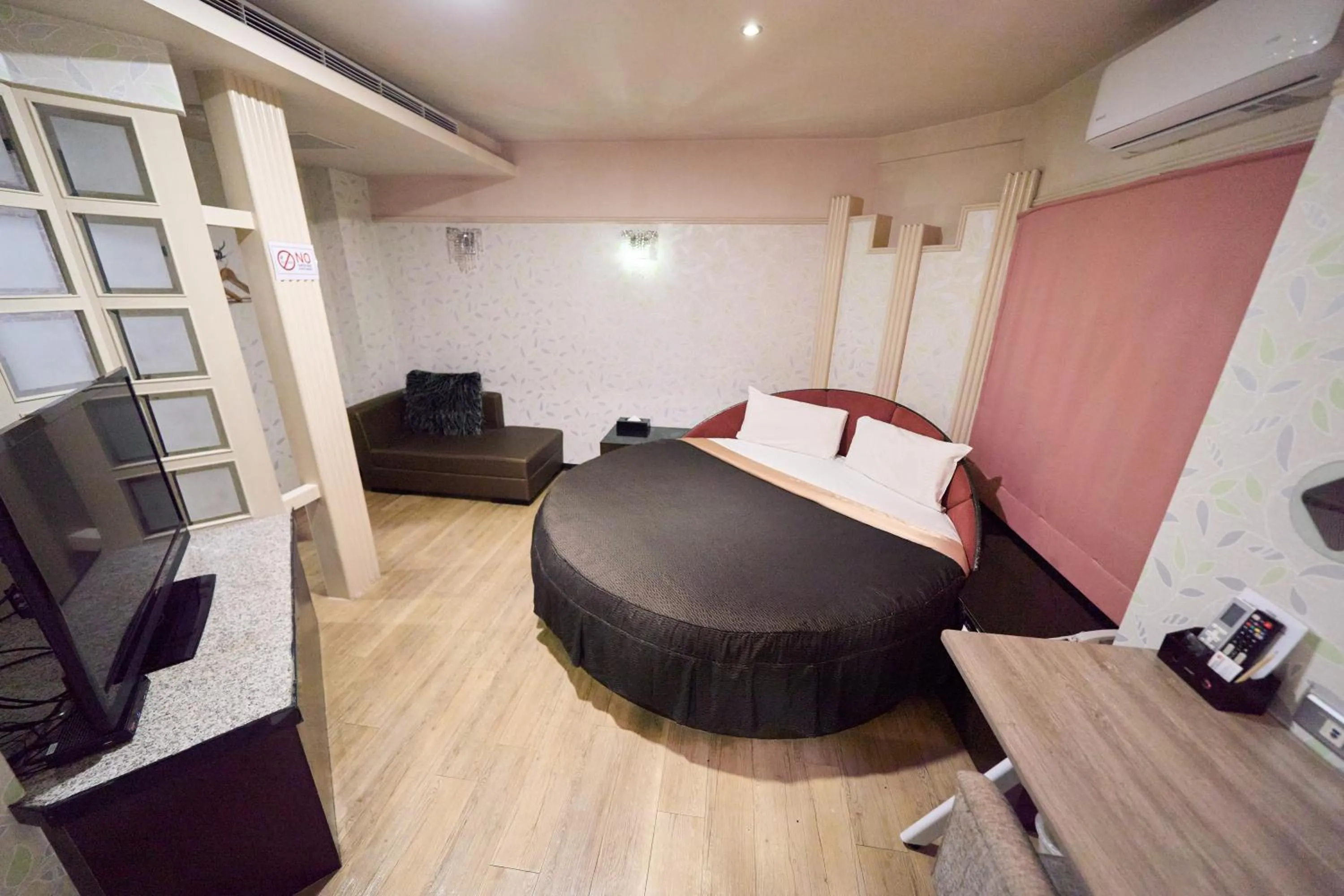 Bed in The Riverside Hotel Fashion