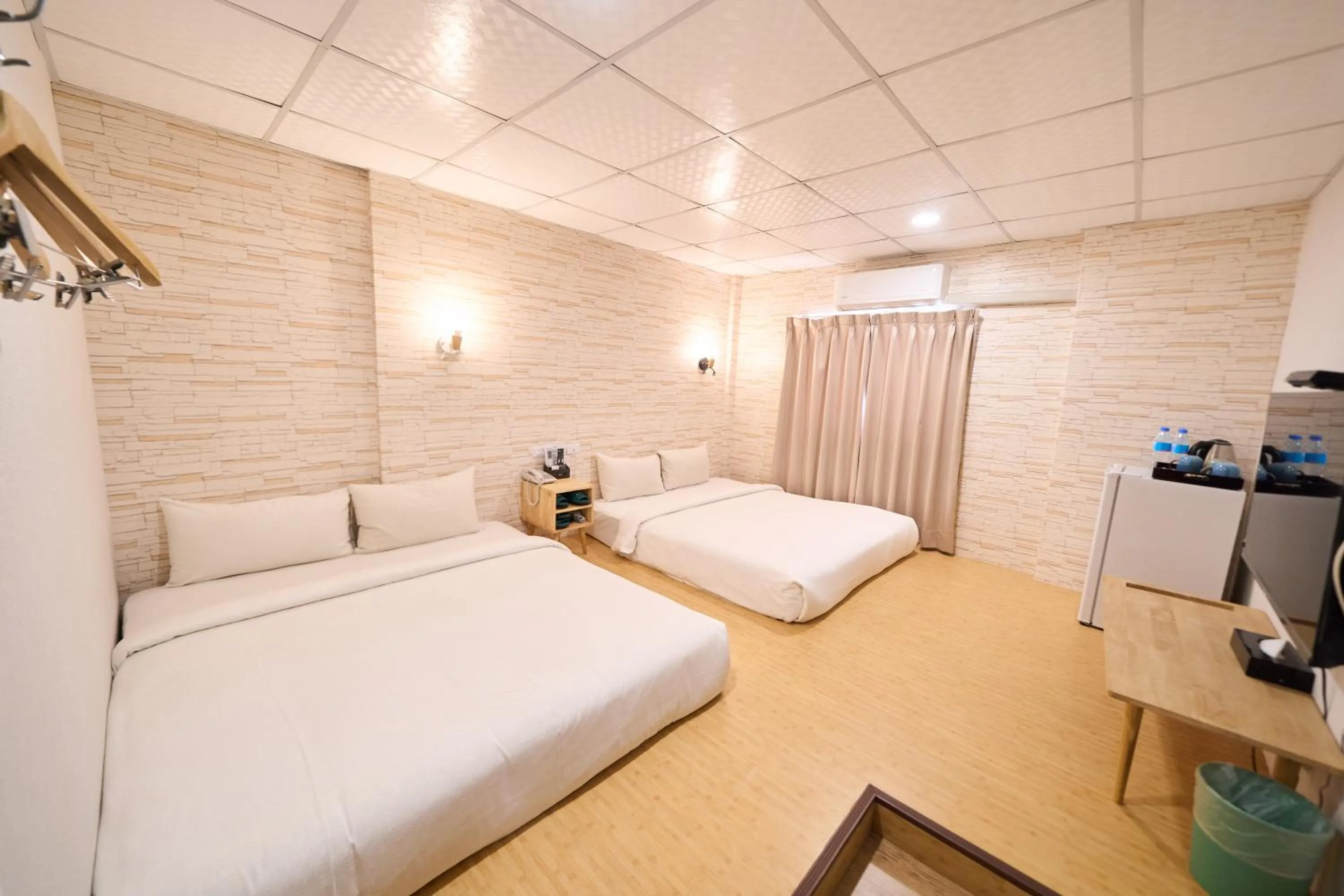 Bed in The Riverside Hotel Fashion