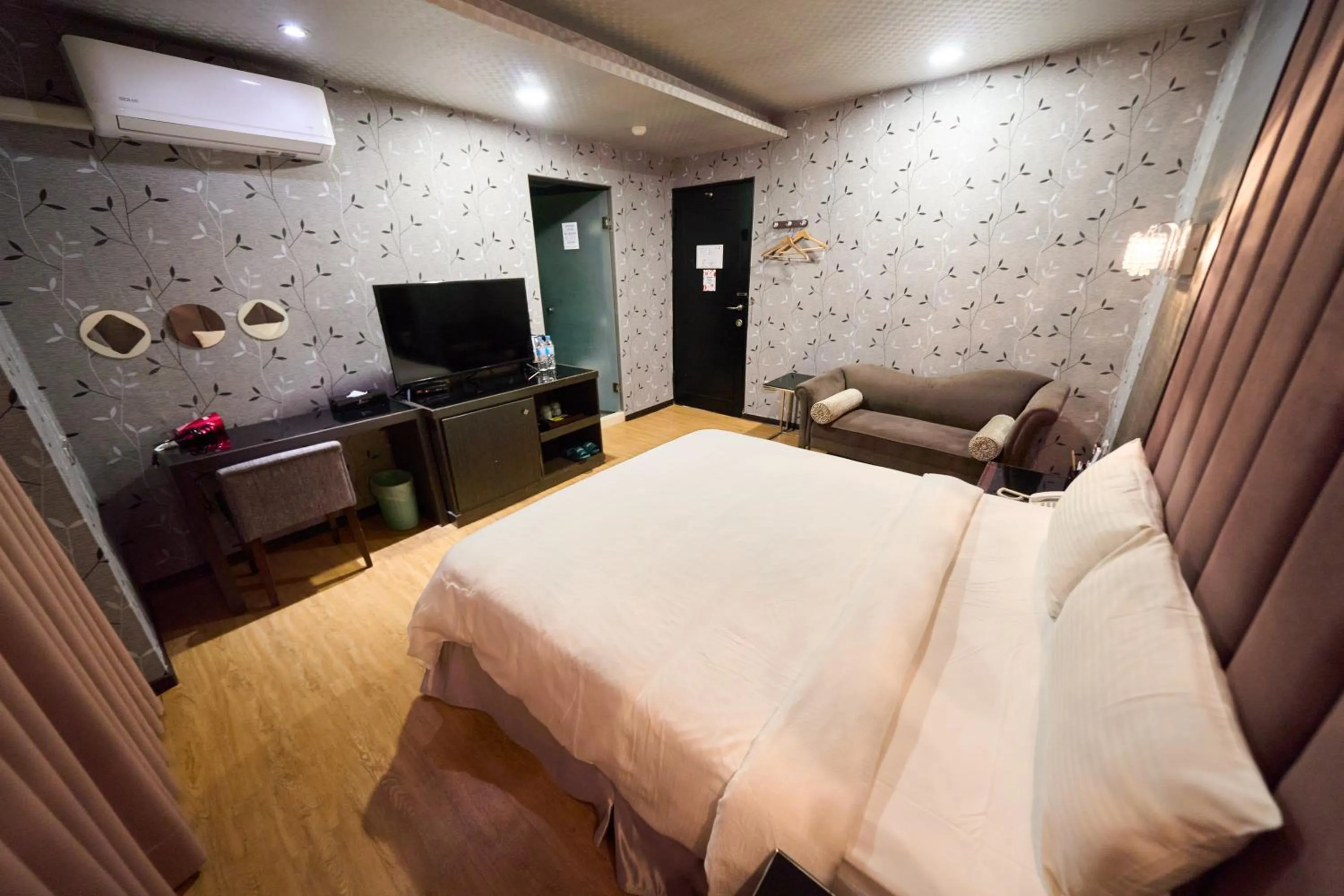 Bed in The Riverside Hotel Fashion