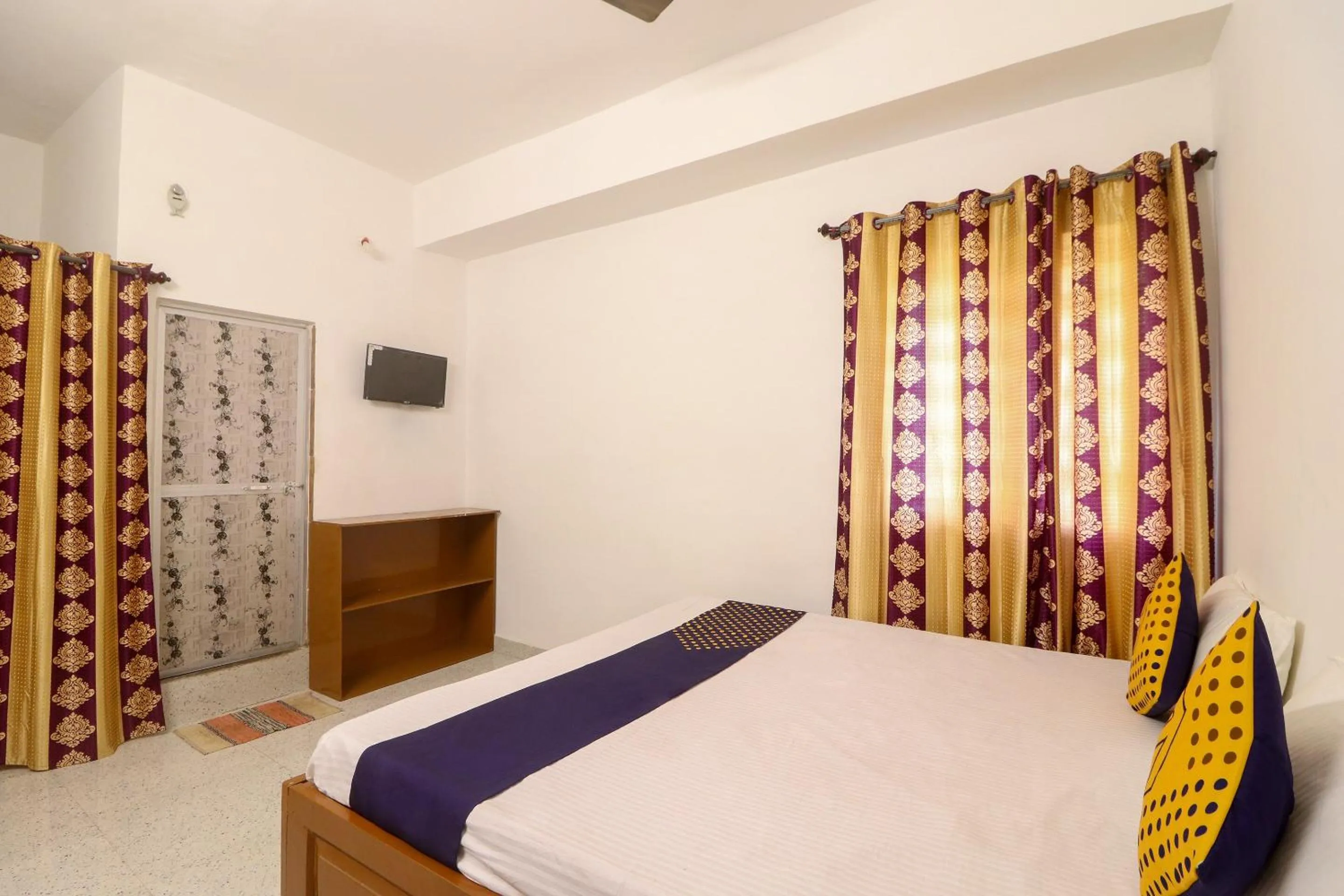 Bedroom in SPOT ON Hotel Om Kanha
