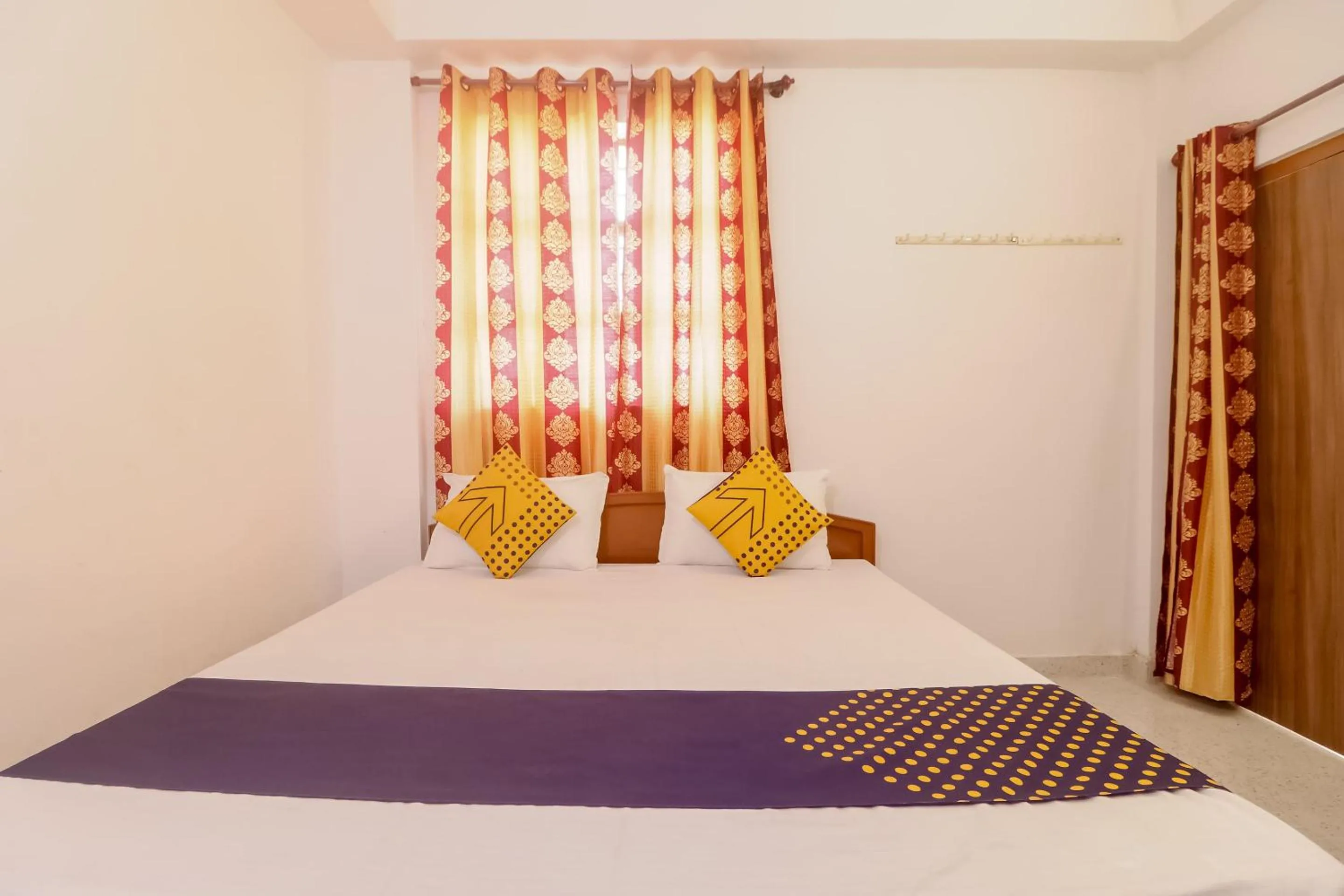 Bedroom in SPOT ON Hotel Om Kanha