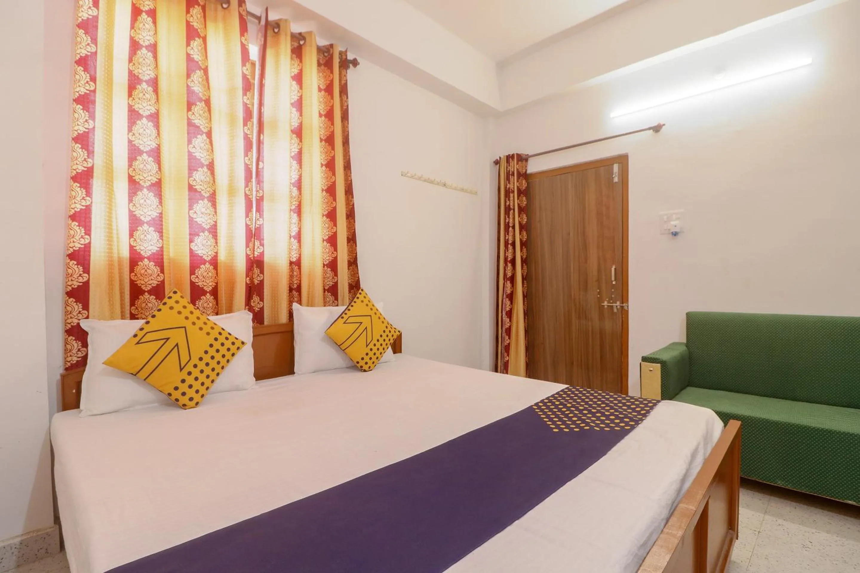Bedroom in SPOT ON Hotel Om Kanha