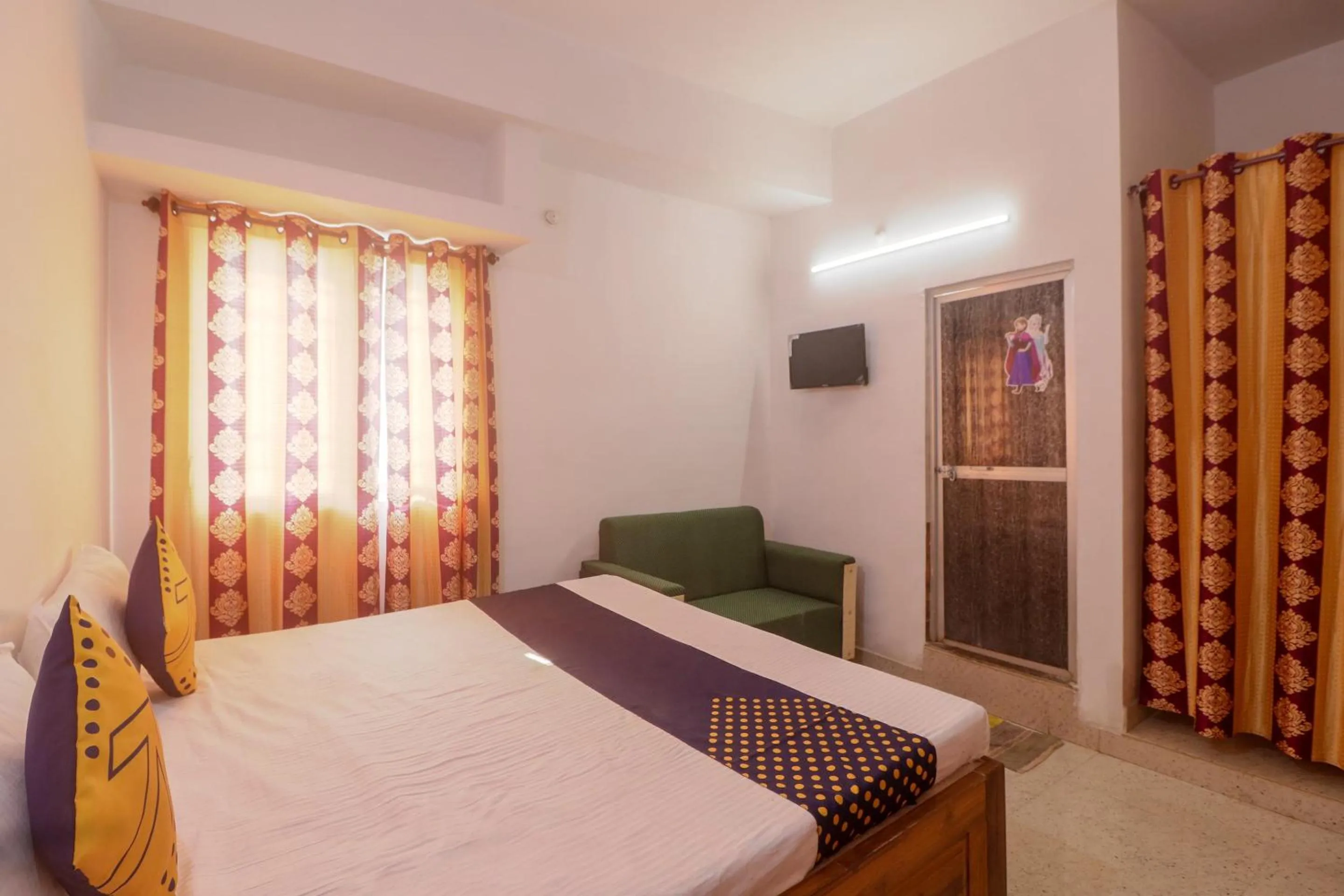 Bedroom in SPOT ON Hotel Om Kanha