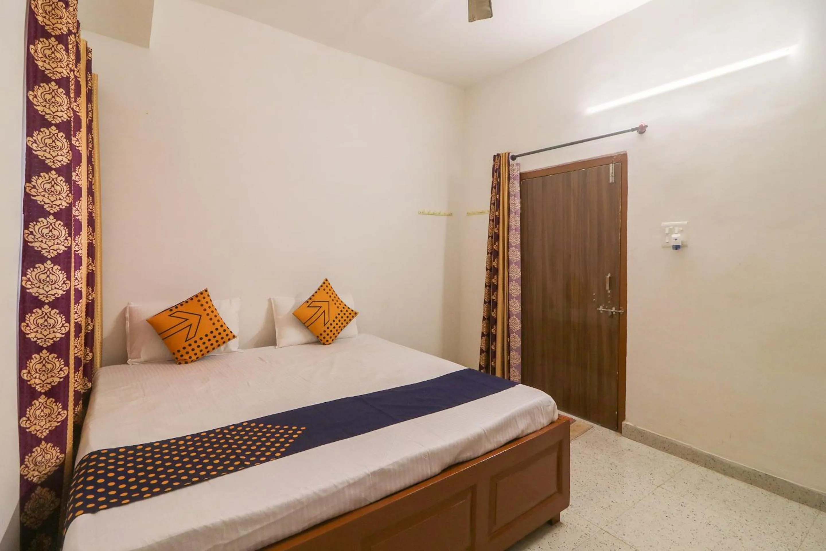 Bedroom in SPOT ON Hotel Om Kanha