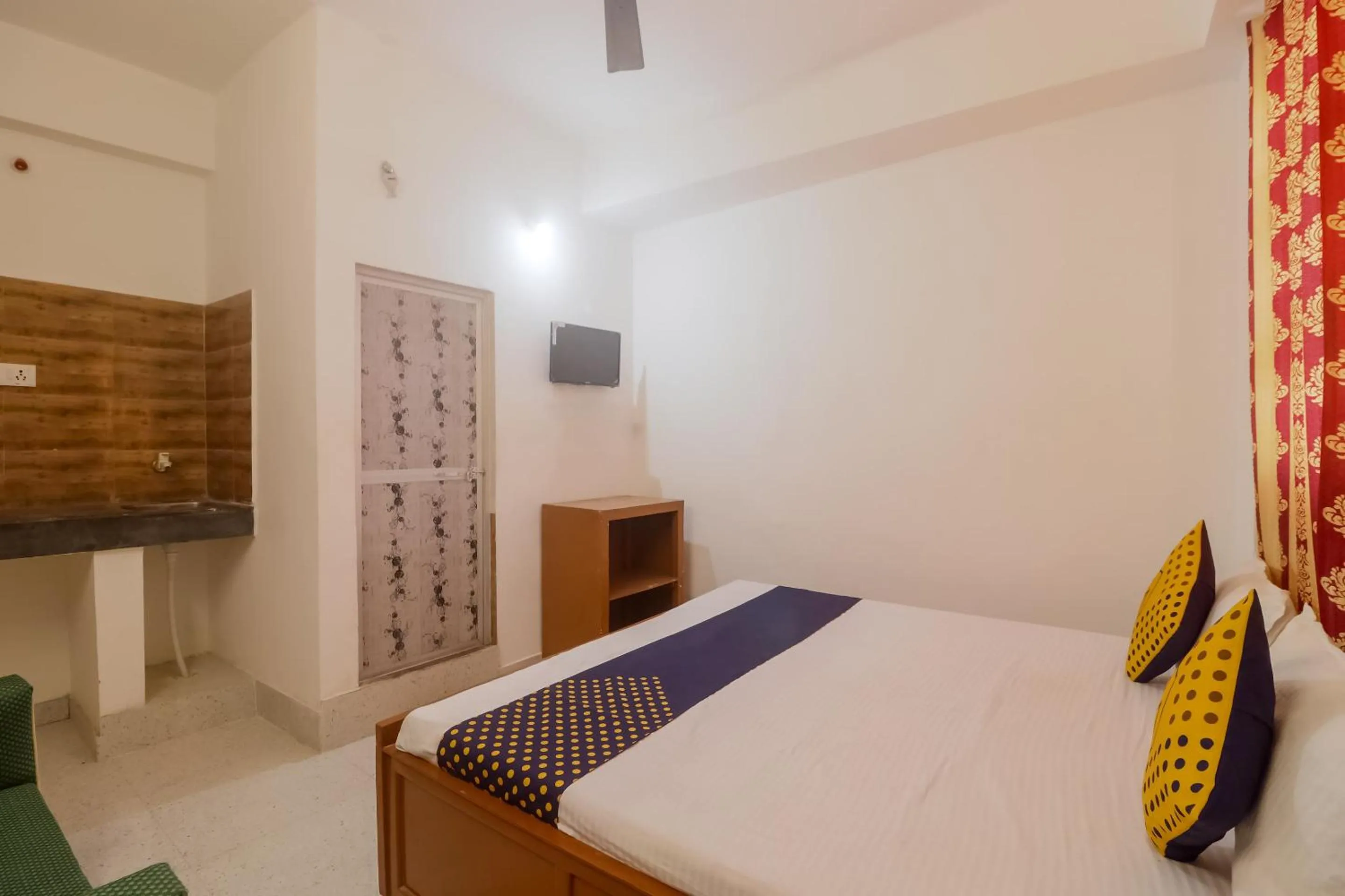 Bedroom in SPOT ON Hotel Om Kanha