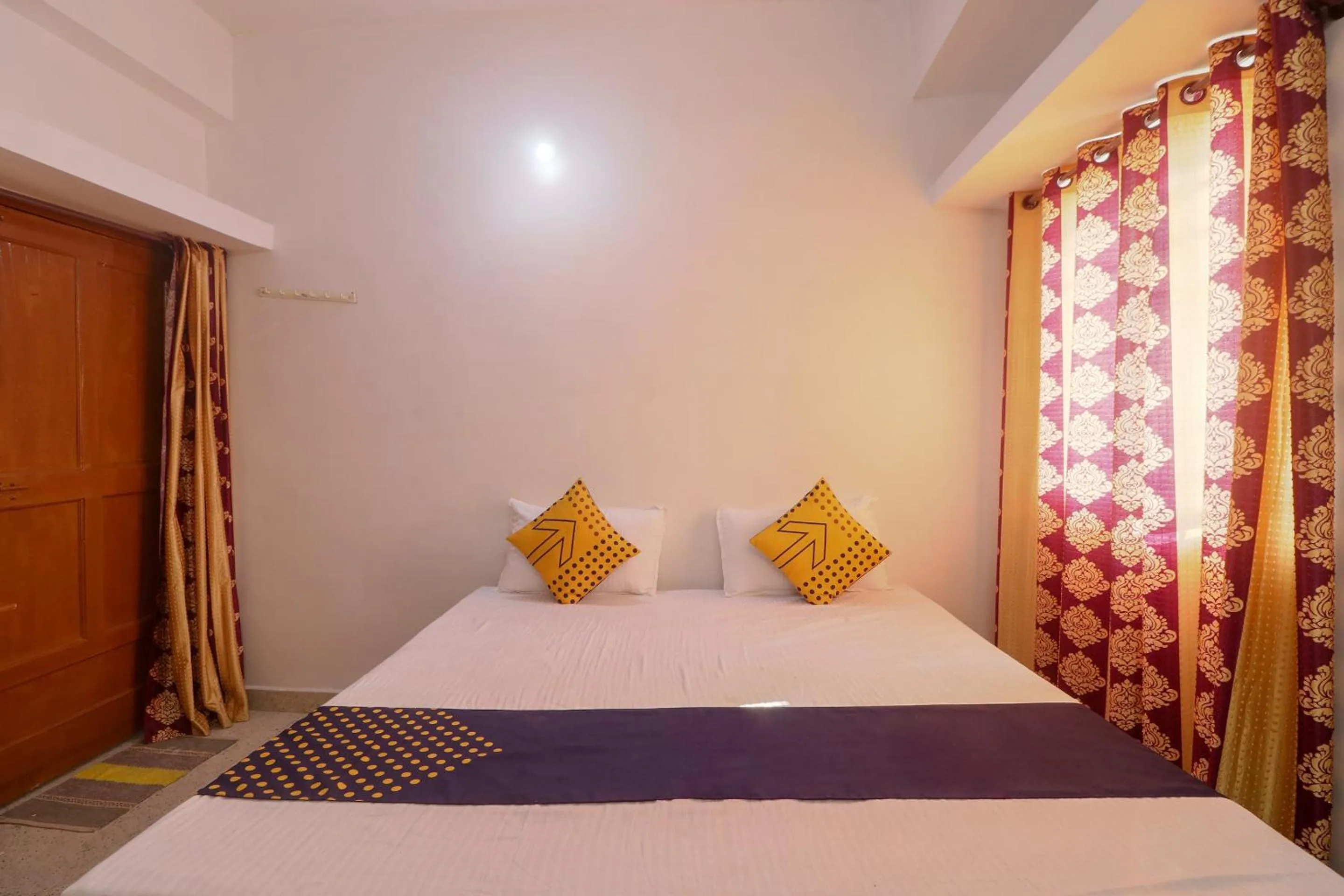 Bedroom in SPOT ON Hotel Om Kanha