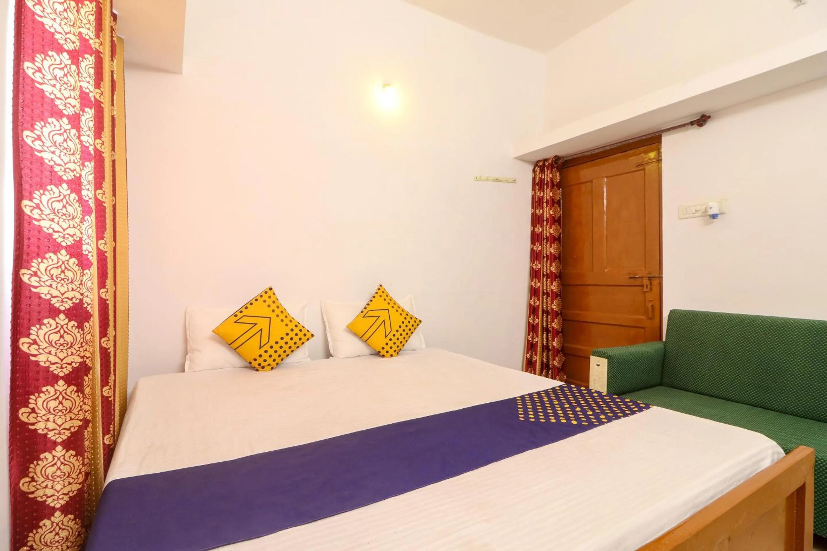 Bedroom in SPOT ON Hotel Om Kanha