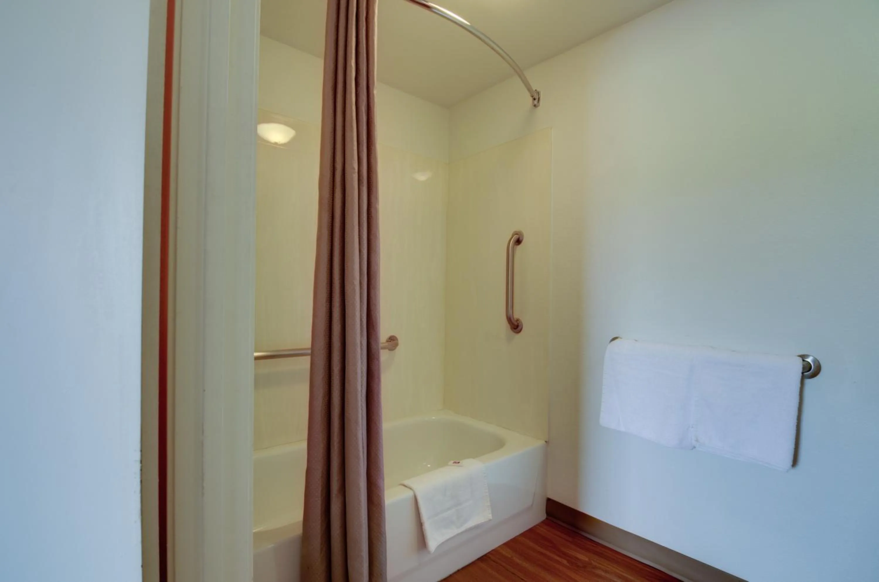 Bathroom, Bed in Motel 6-Kansas City, MO