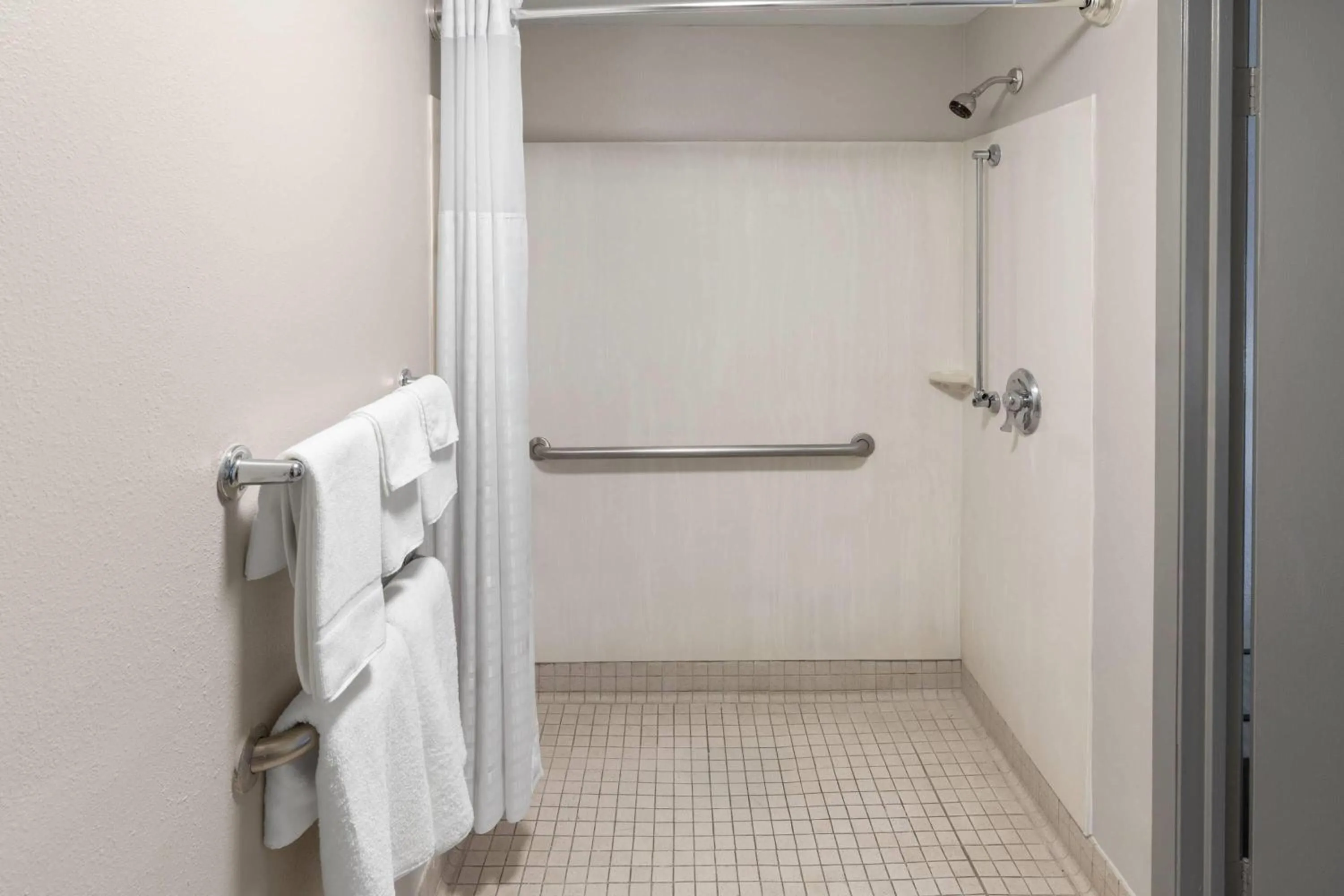 Shower in Days Inn by Wyndham Kansas City Northeast
