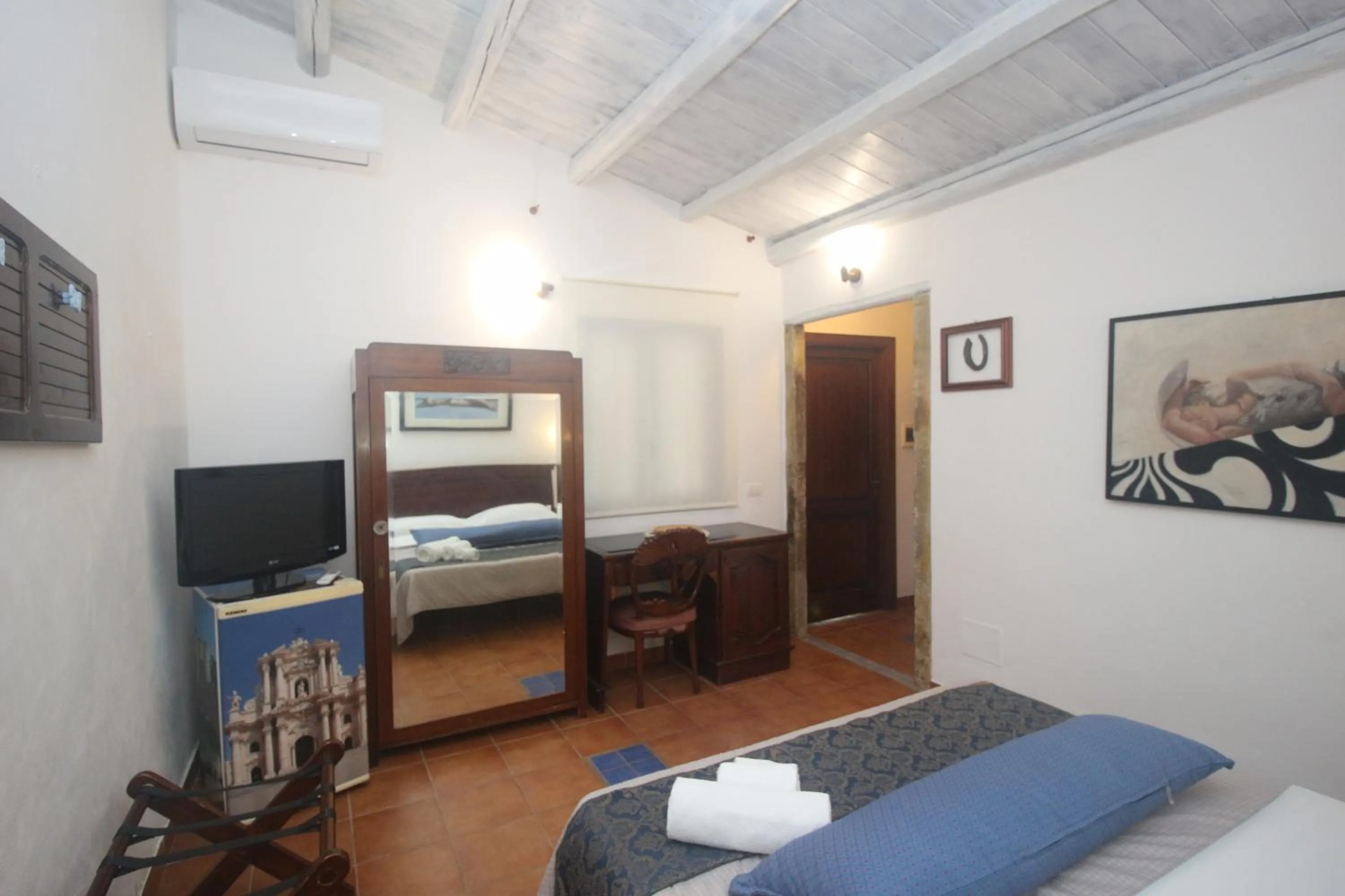 Bed in Aranceto Hotel