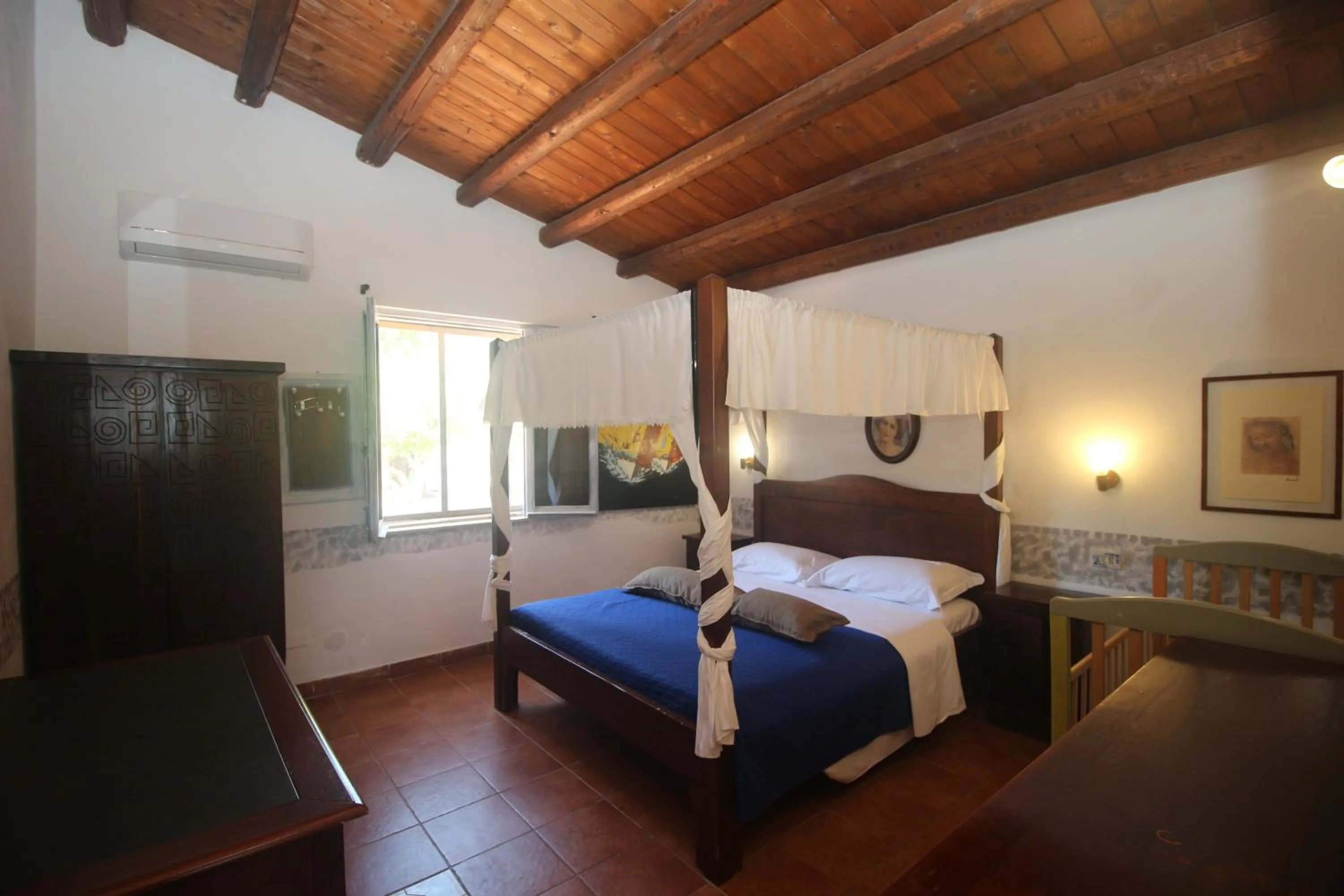 Bed in Aranceto Hotel