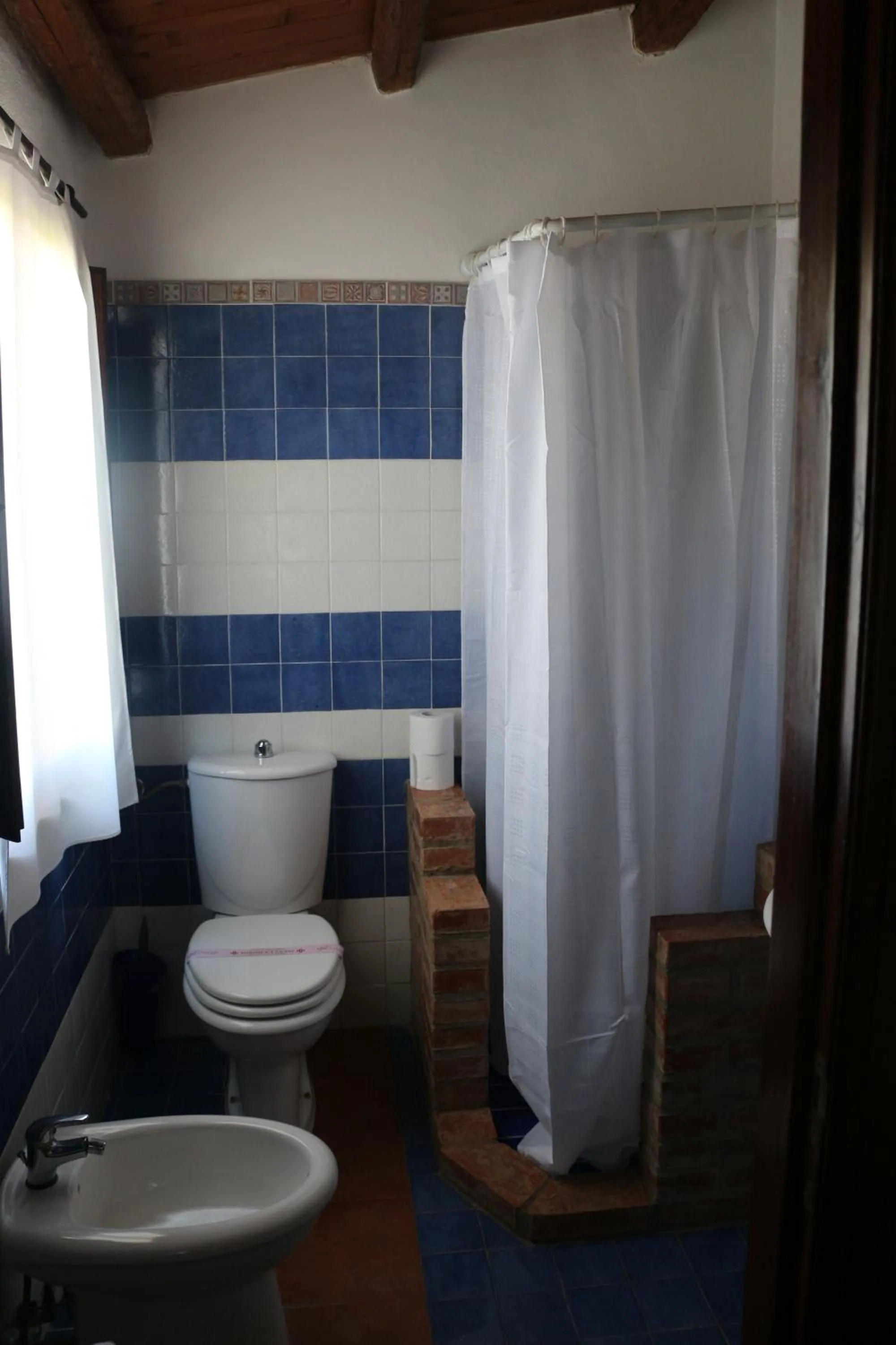 Toilet in Aranceto Hotel