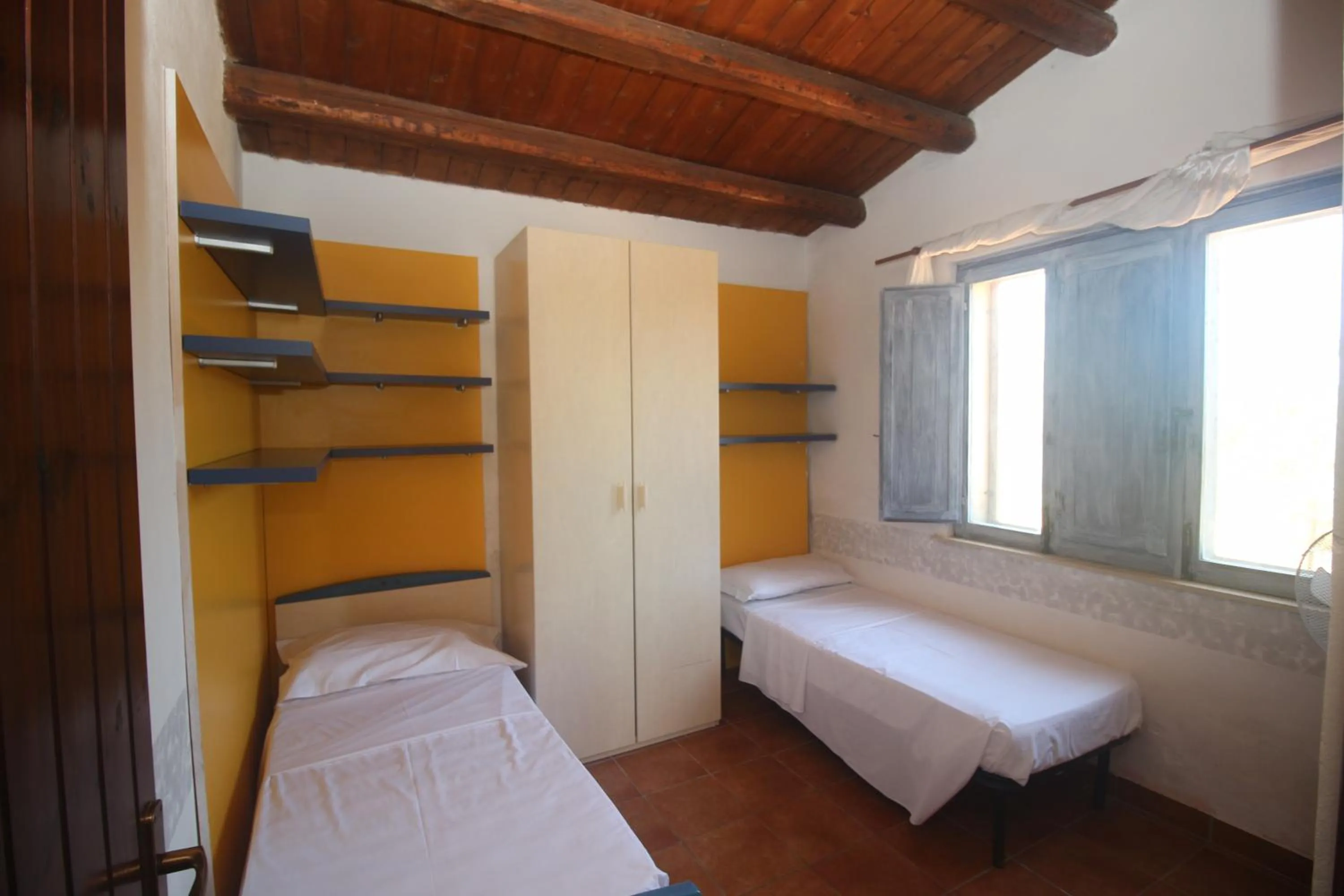 Bed in Aranceto Hotel