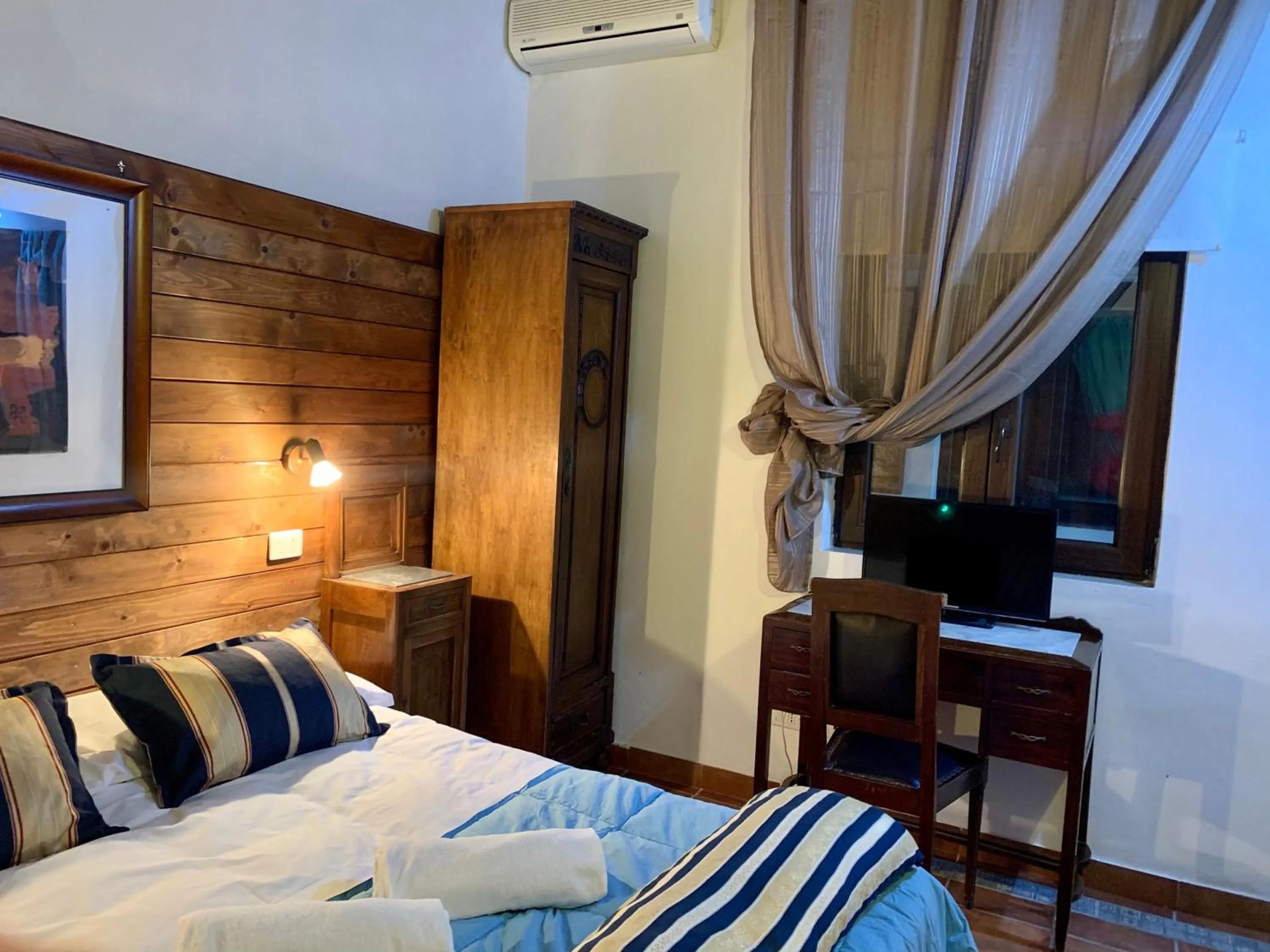 Bed in Aranceto Hotel