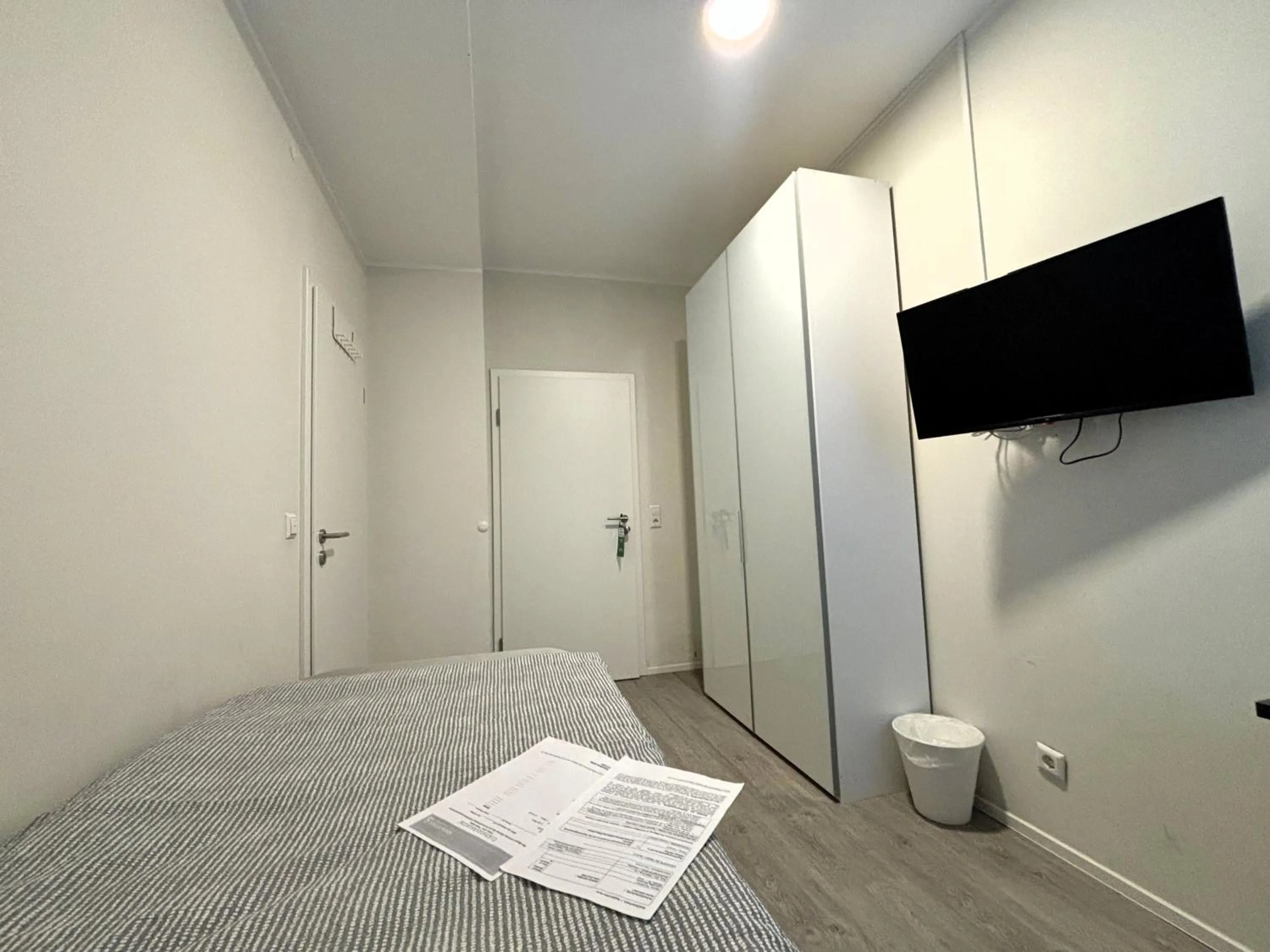 Photo of the whole room, Bed in Simplex Stays Hotel Quartier 8 - Digital Access