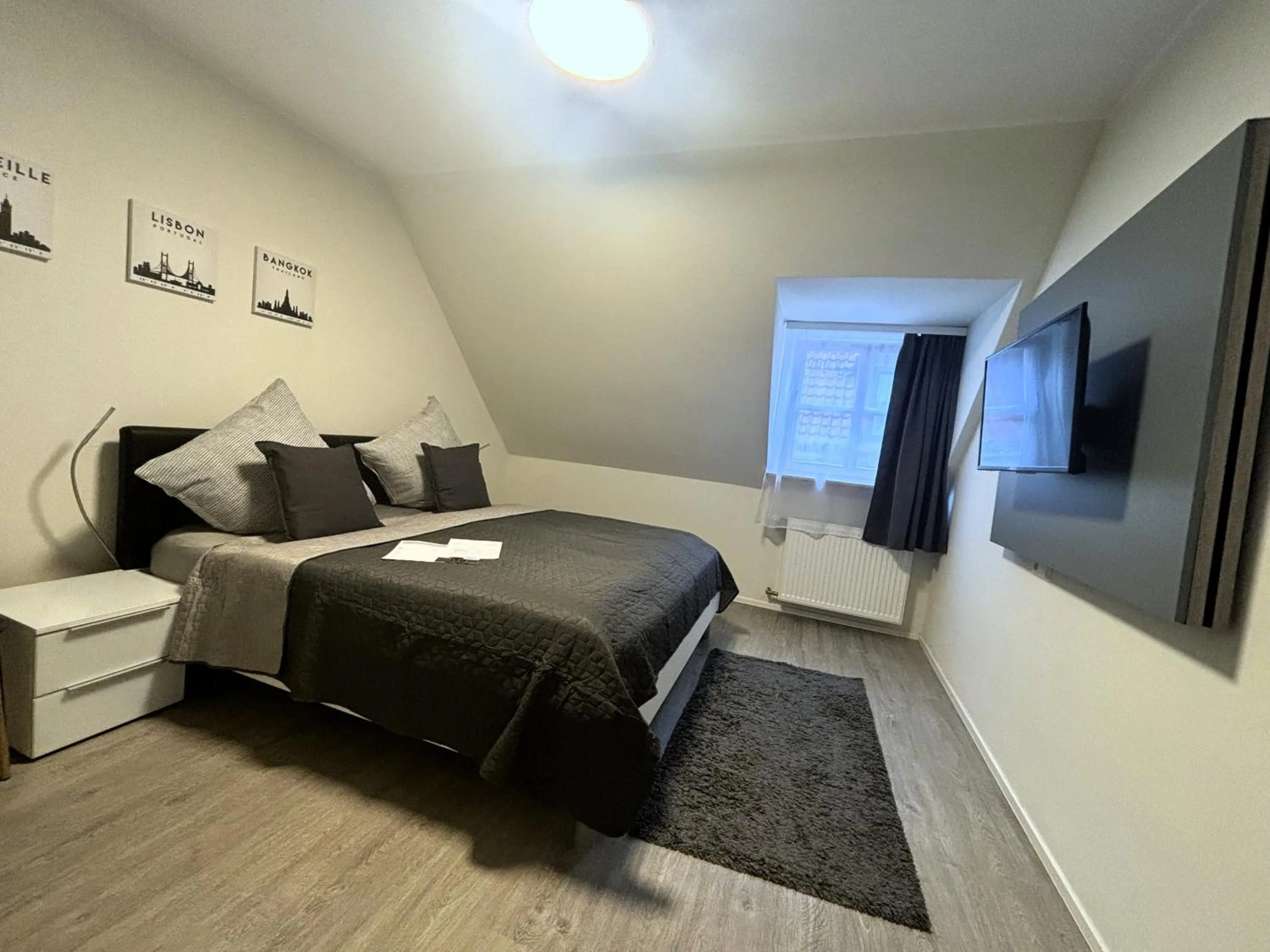 Bedroom, Bed in Simplex Stays Hotel Quartier 8 - Digital Access