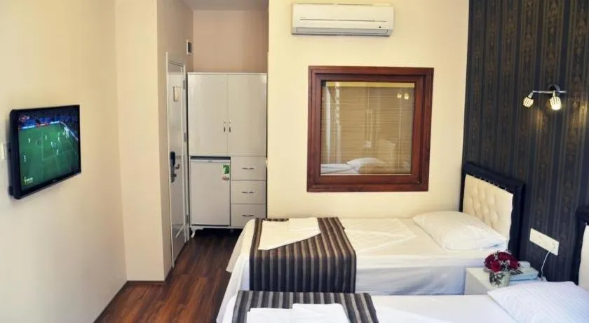 Bed in Gh Suites Taxim Hotel