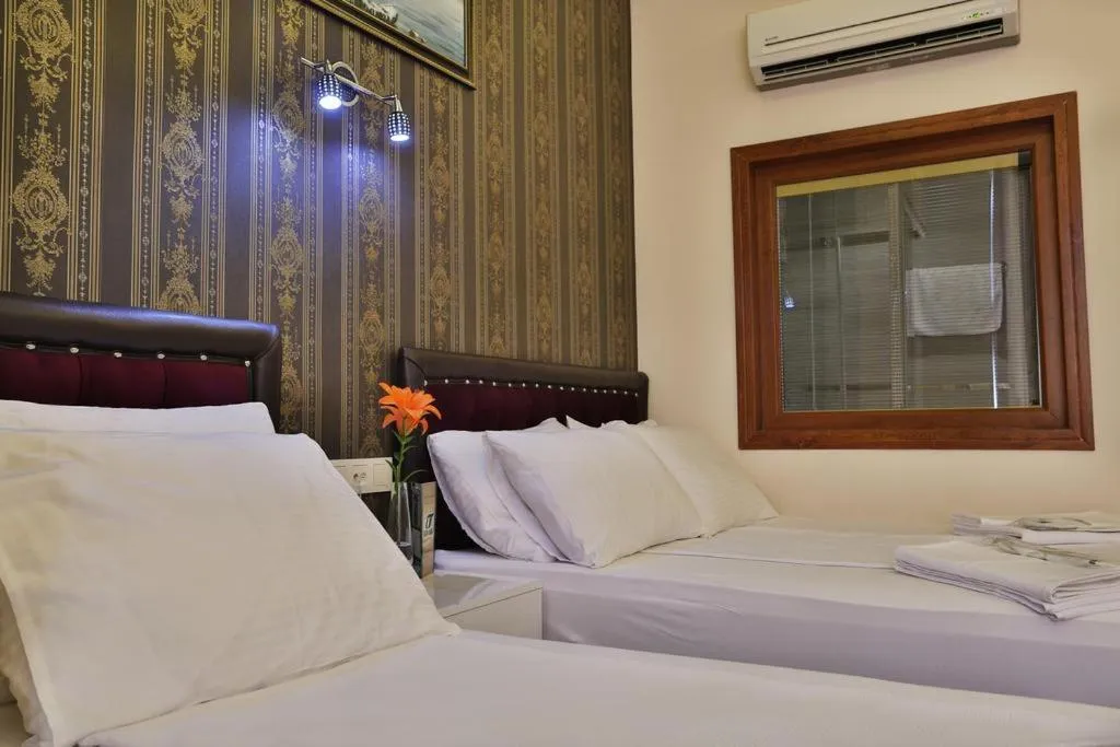 Bed in Gh Suites Taxim Hotel