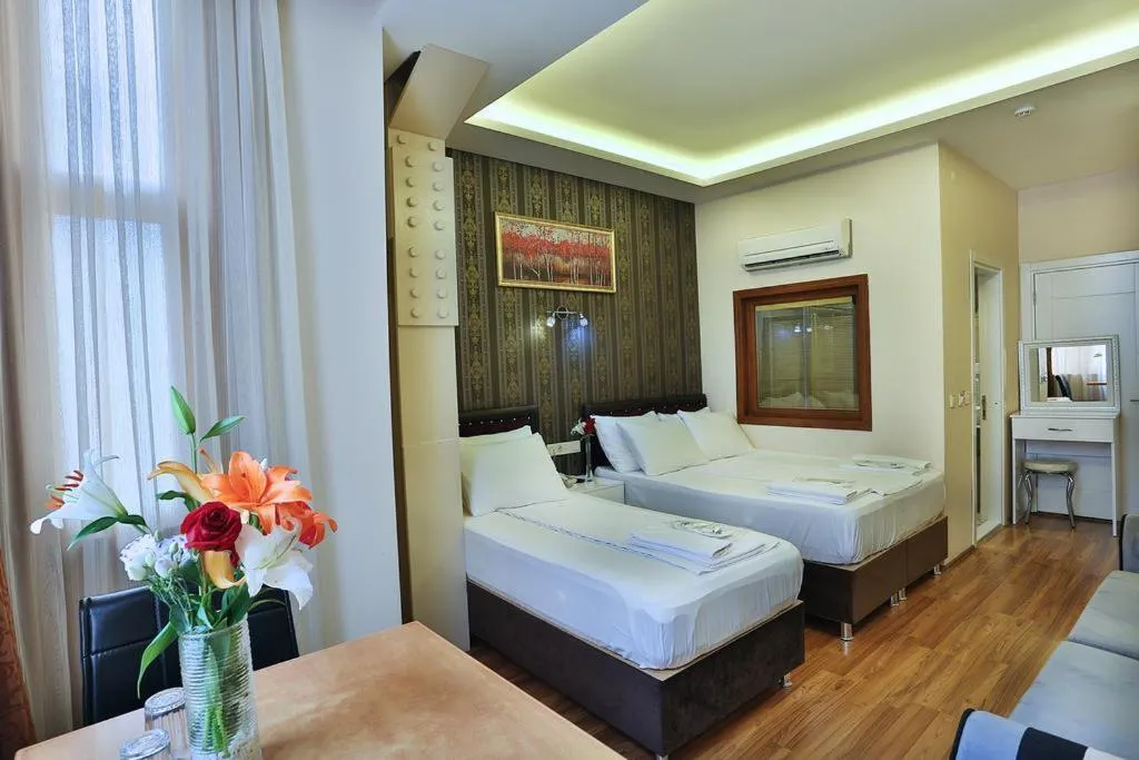 Bed in Gh Suites Taxim Hotel