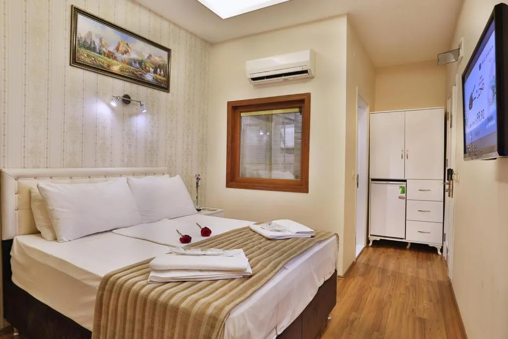 Bed in Gh Suites Taxim Hotel