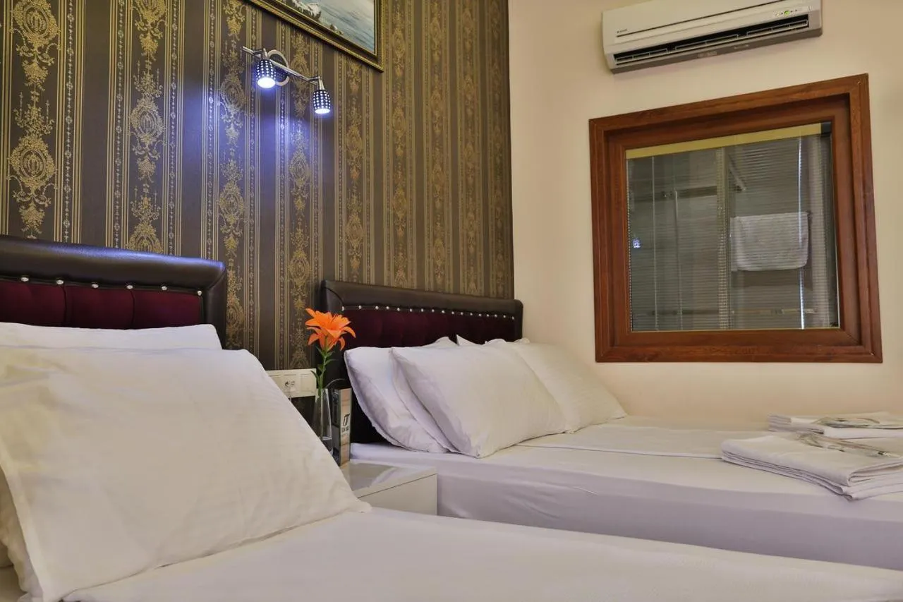 Bed in Gh Suites Taxim Hotel