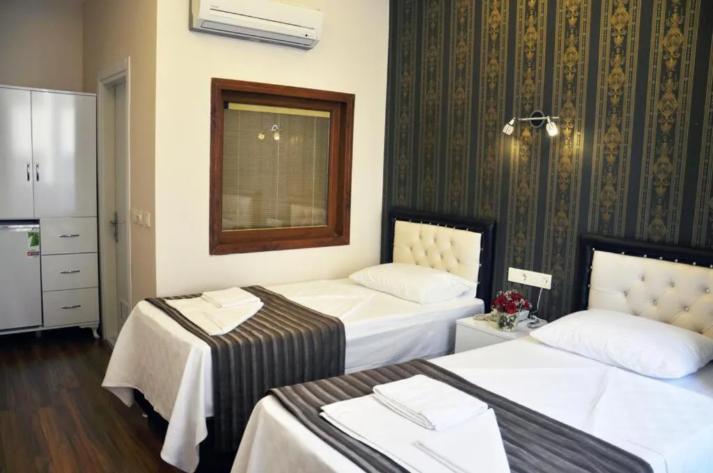 Bed in Gh Suites Taxim Hotel