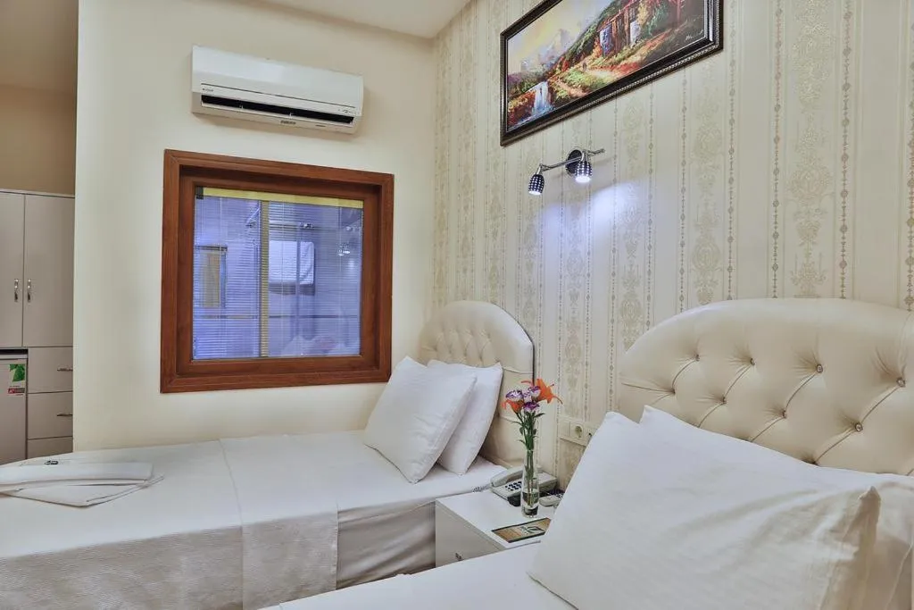 Bed in Gh Suites Taxim Hotel