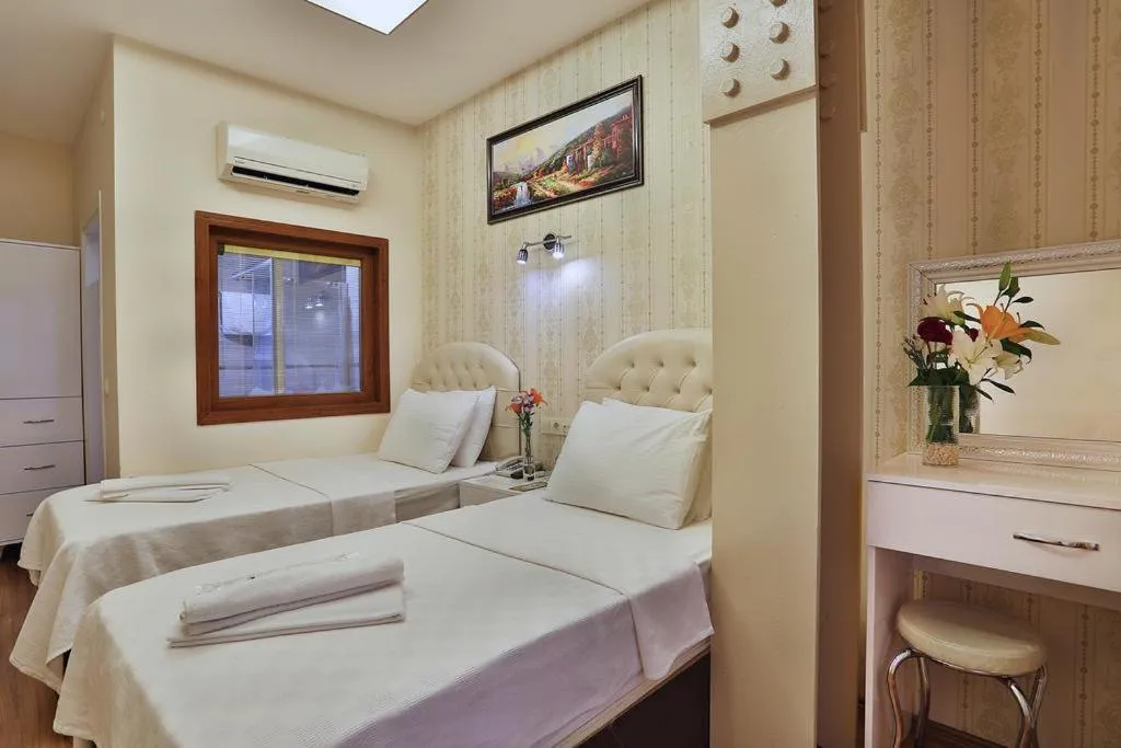 Bed in Gh Suites Taxim Hotel