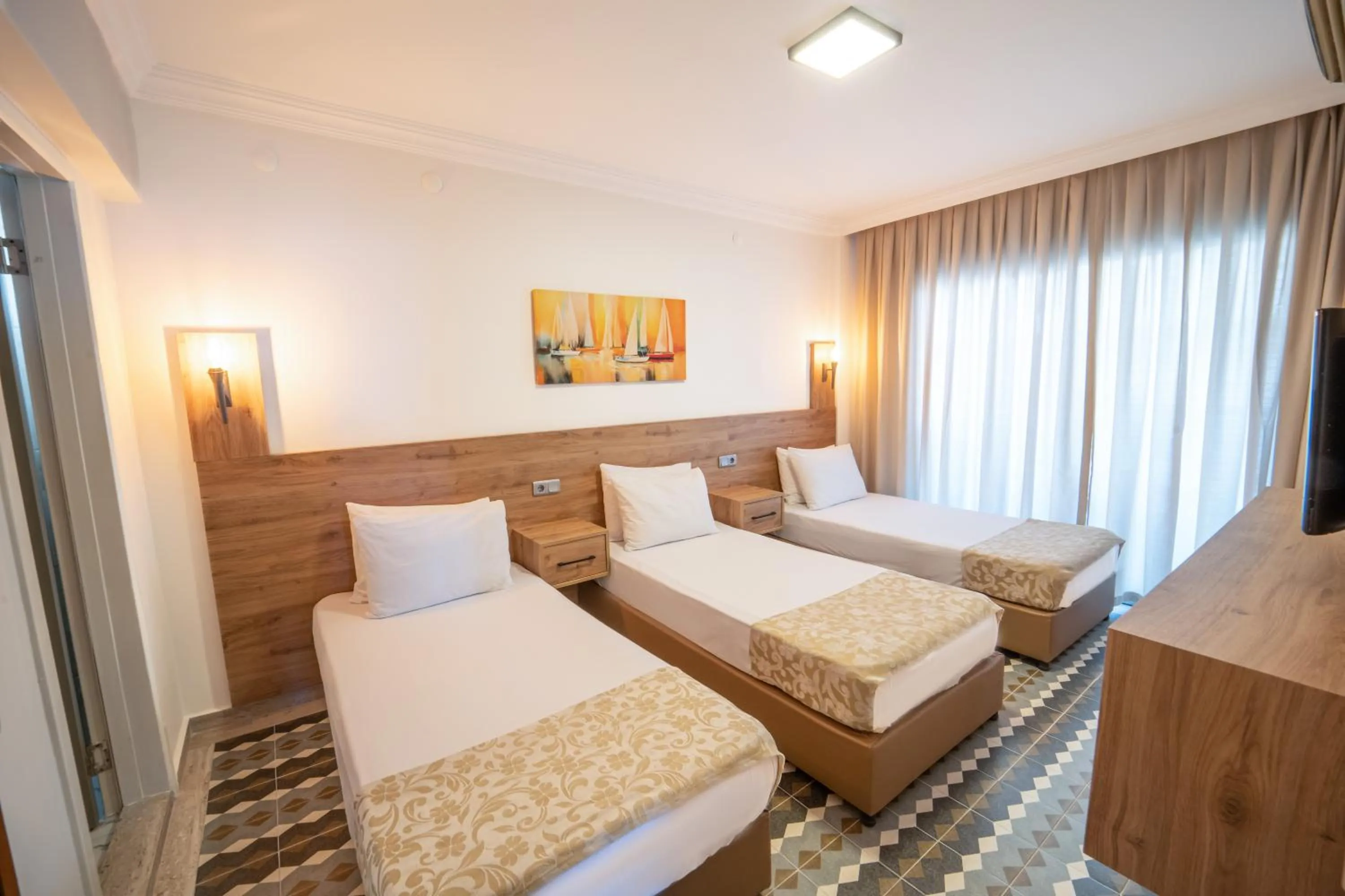 Bed in Moda Beach Hotel