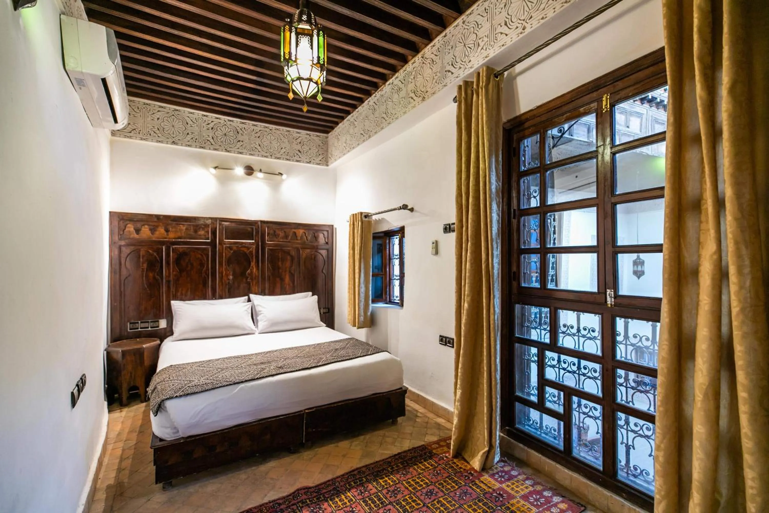 Bed in Riad Fes Aicha & SPA